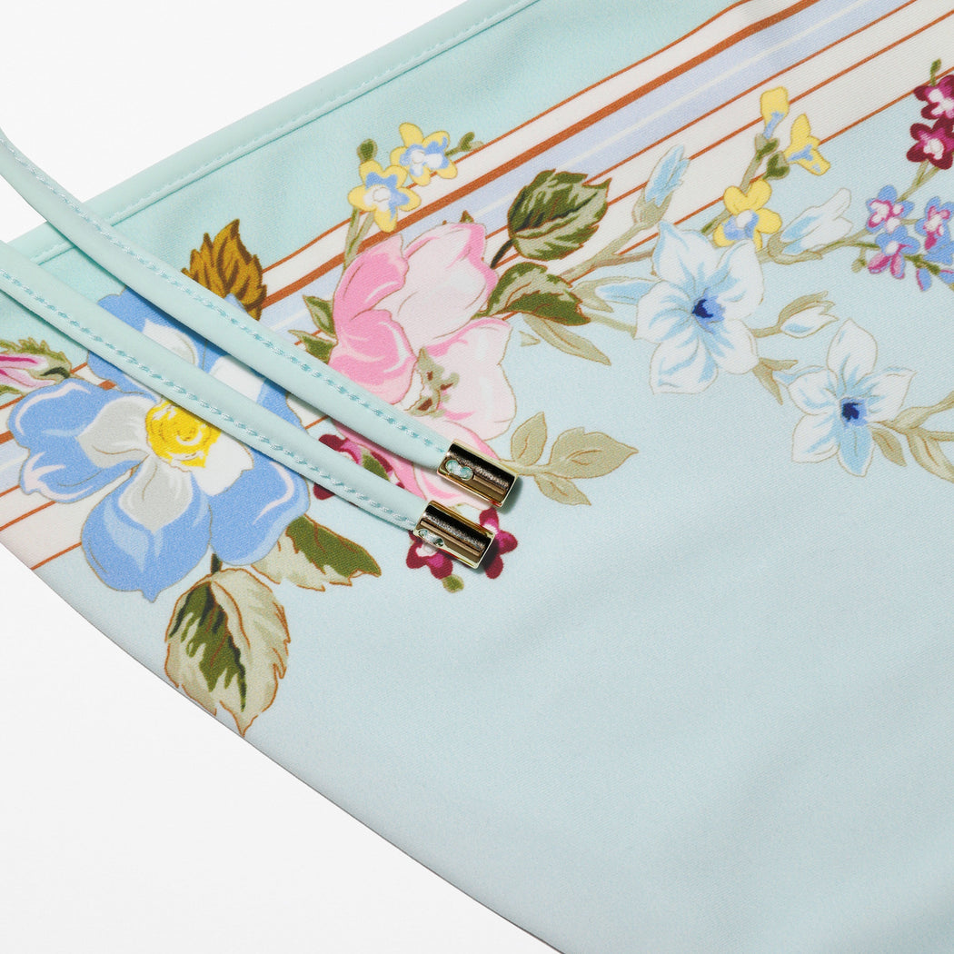 A close up of the fabric for the Mint Floral Bikini Bottoms