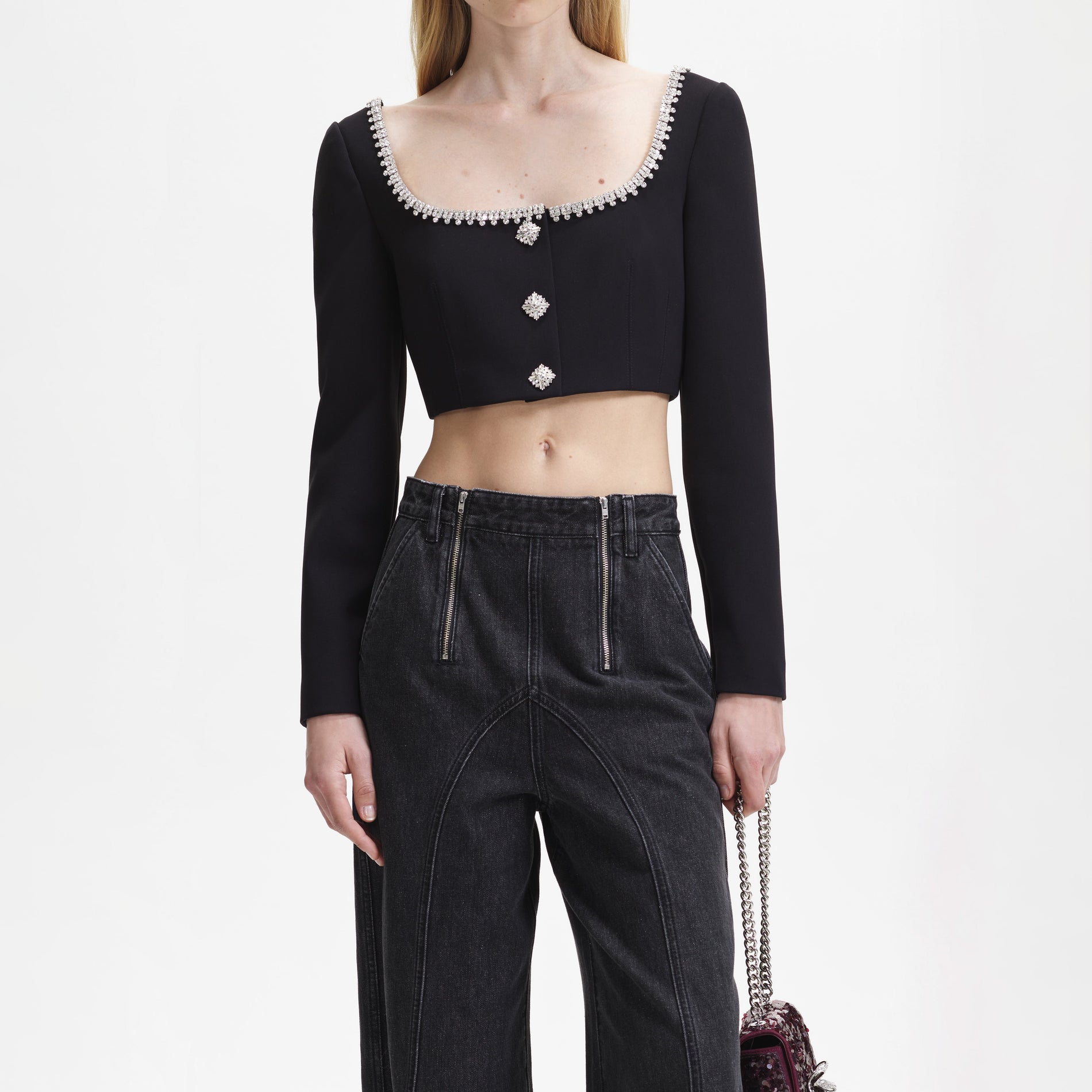 A close up of the fabric for the Black Wide Leg Stitch Detail Jeans