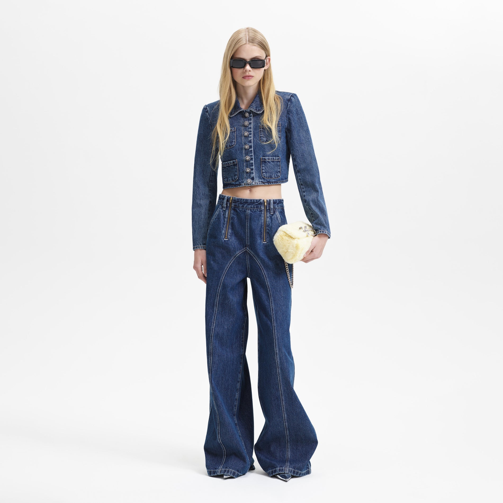 A woman wearing the Denim Jacket