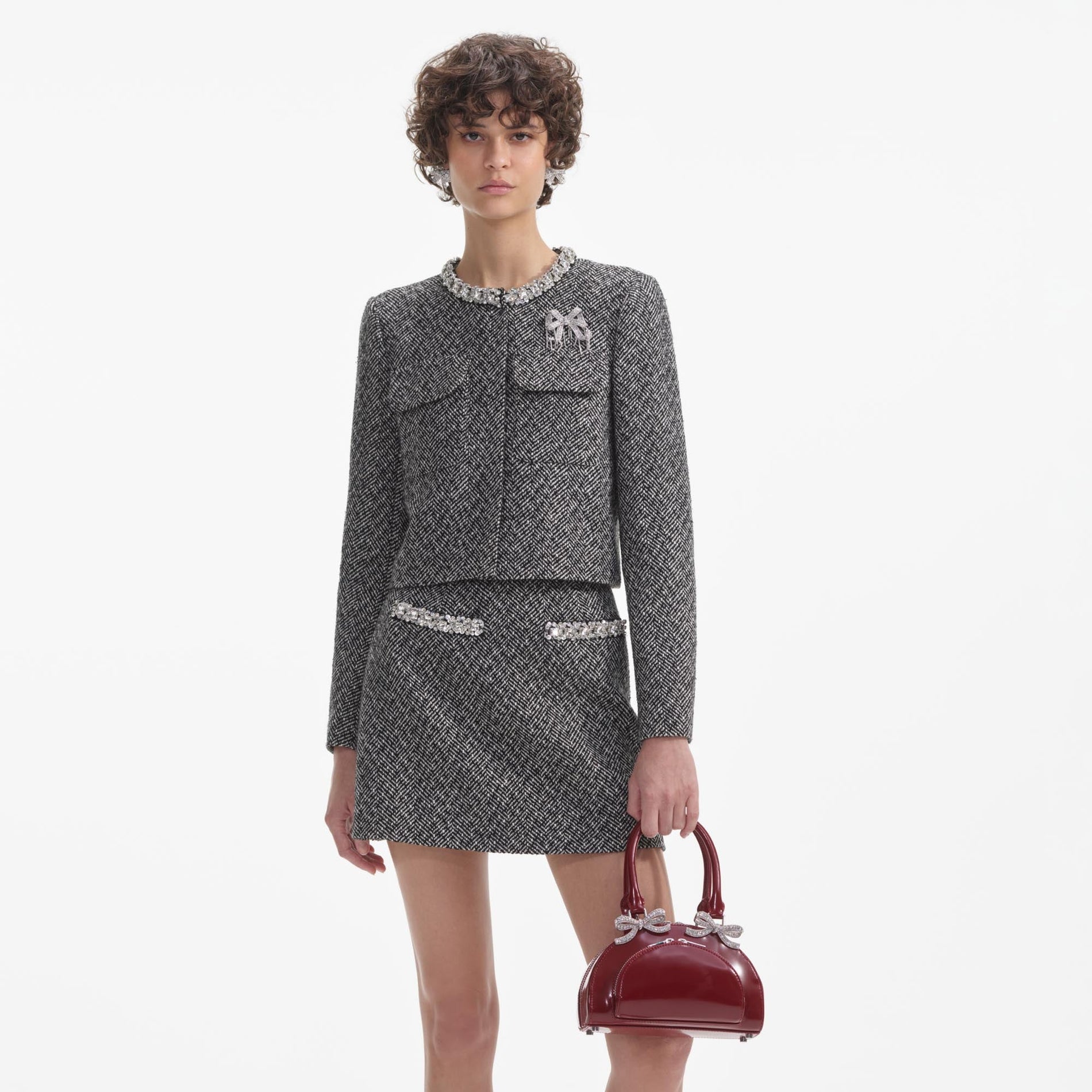 A close up of the fabric for the Burgundy Leather Curved Mini Tote Bag