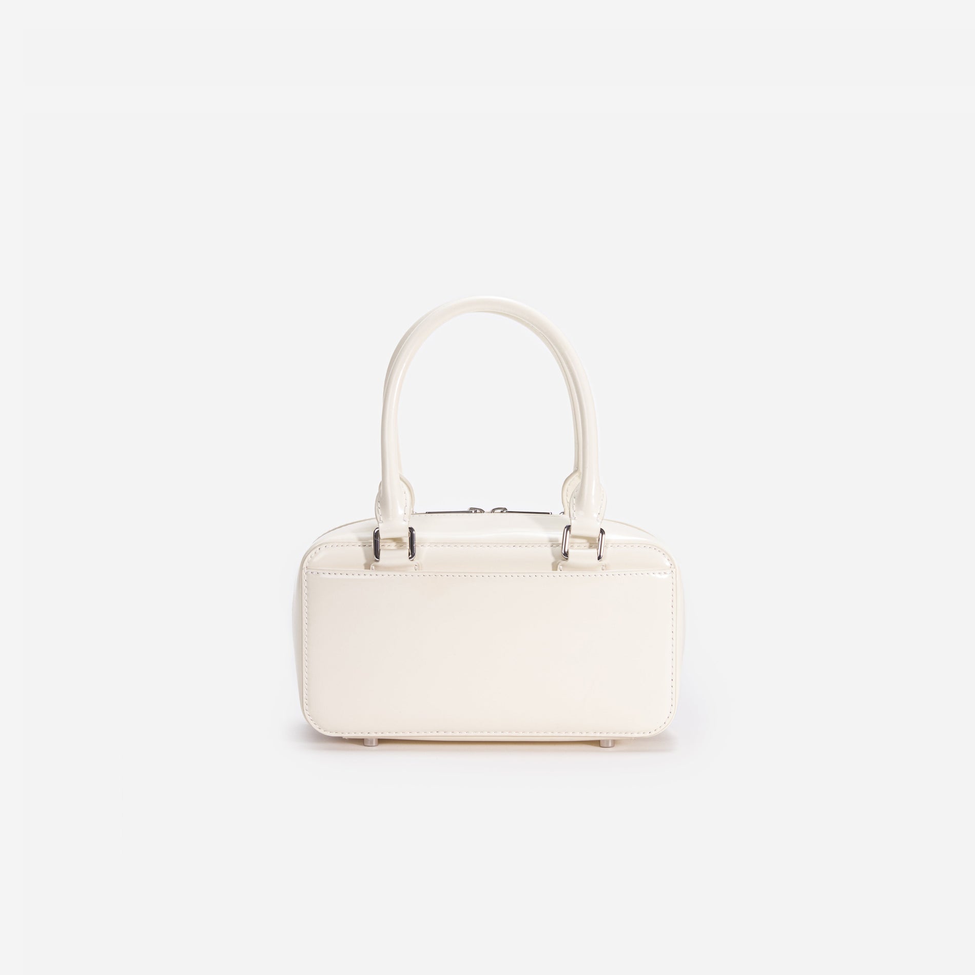 Back view of a woman wearing the White Cream Leather Mini Tote Bag