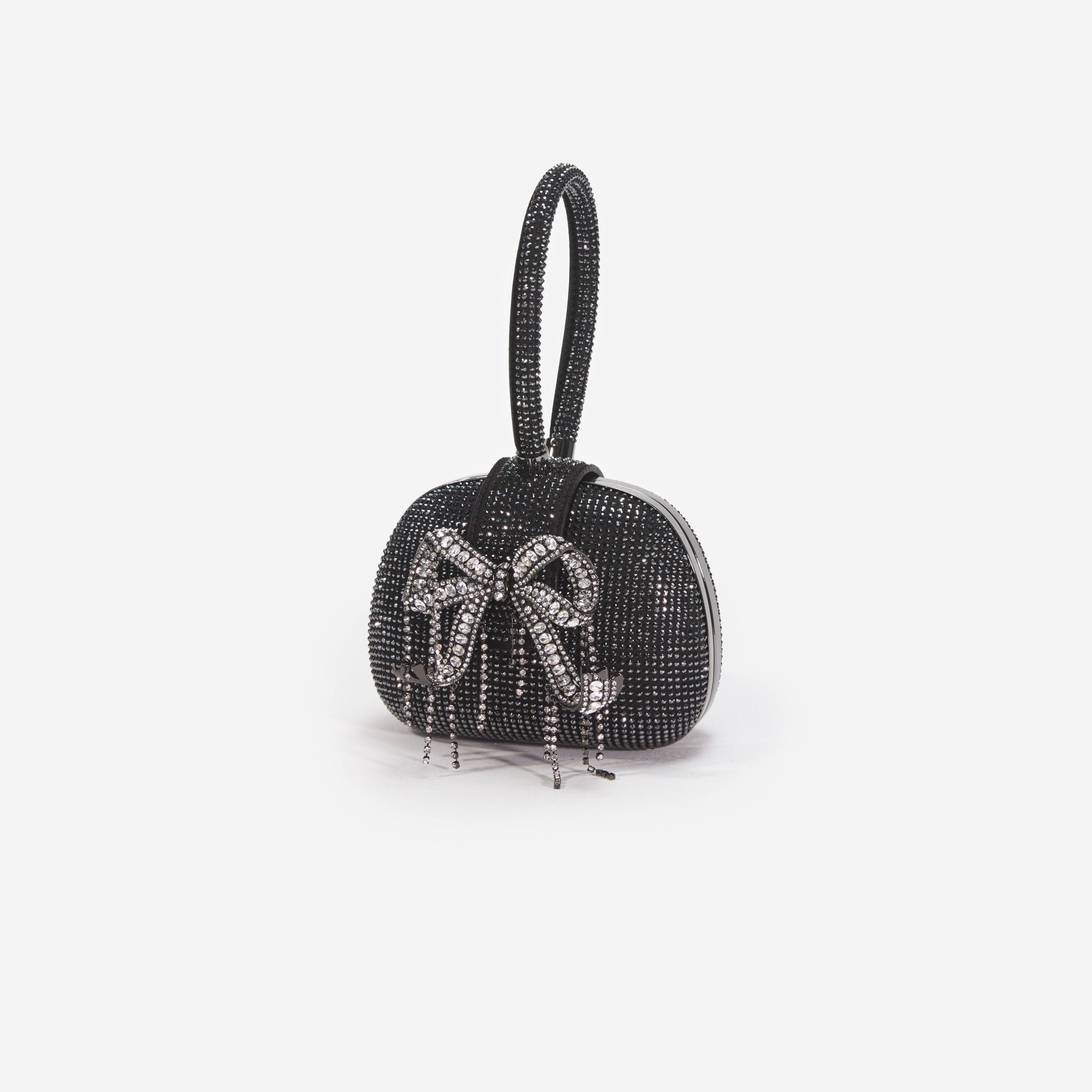 Side view of a woman wearing the Black Rhinestone Top Handle Clutch Bag