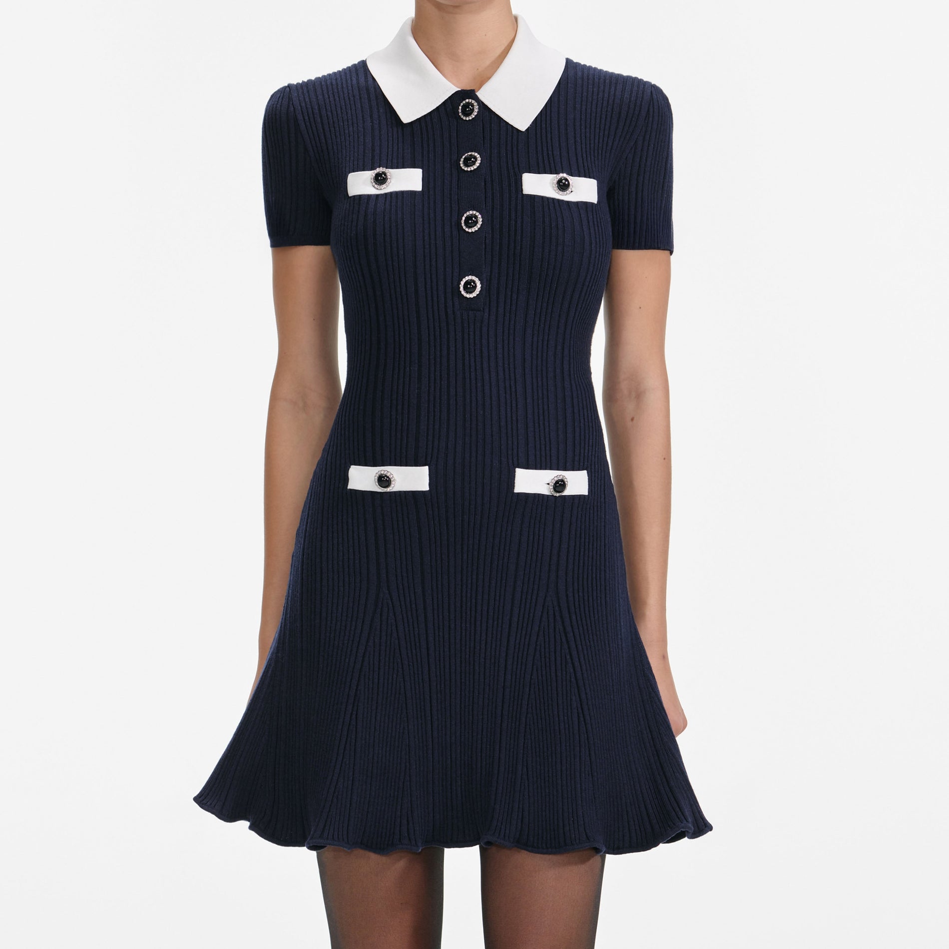 A close up of a woman wearing the Navy Contrast Collar Knit Mini Dress