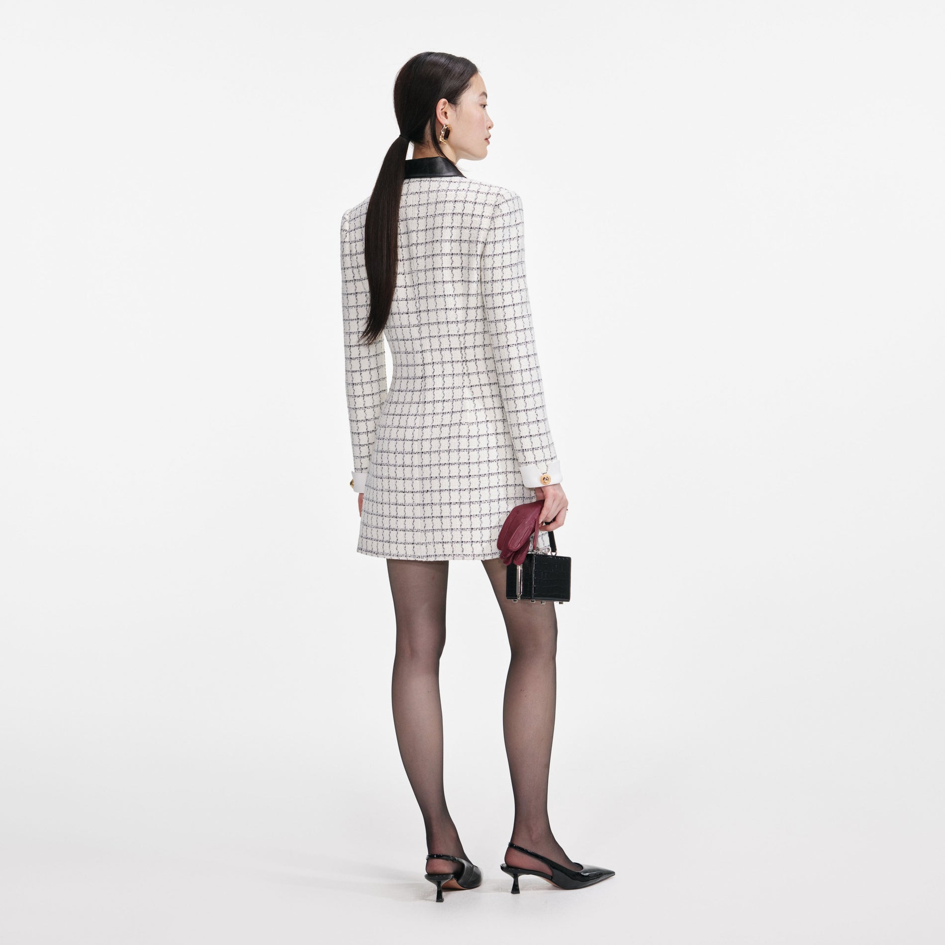 Back view of a woman wearing the Check Boucle Long Sleeve Mini Dress