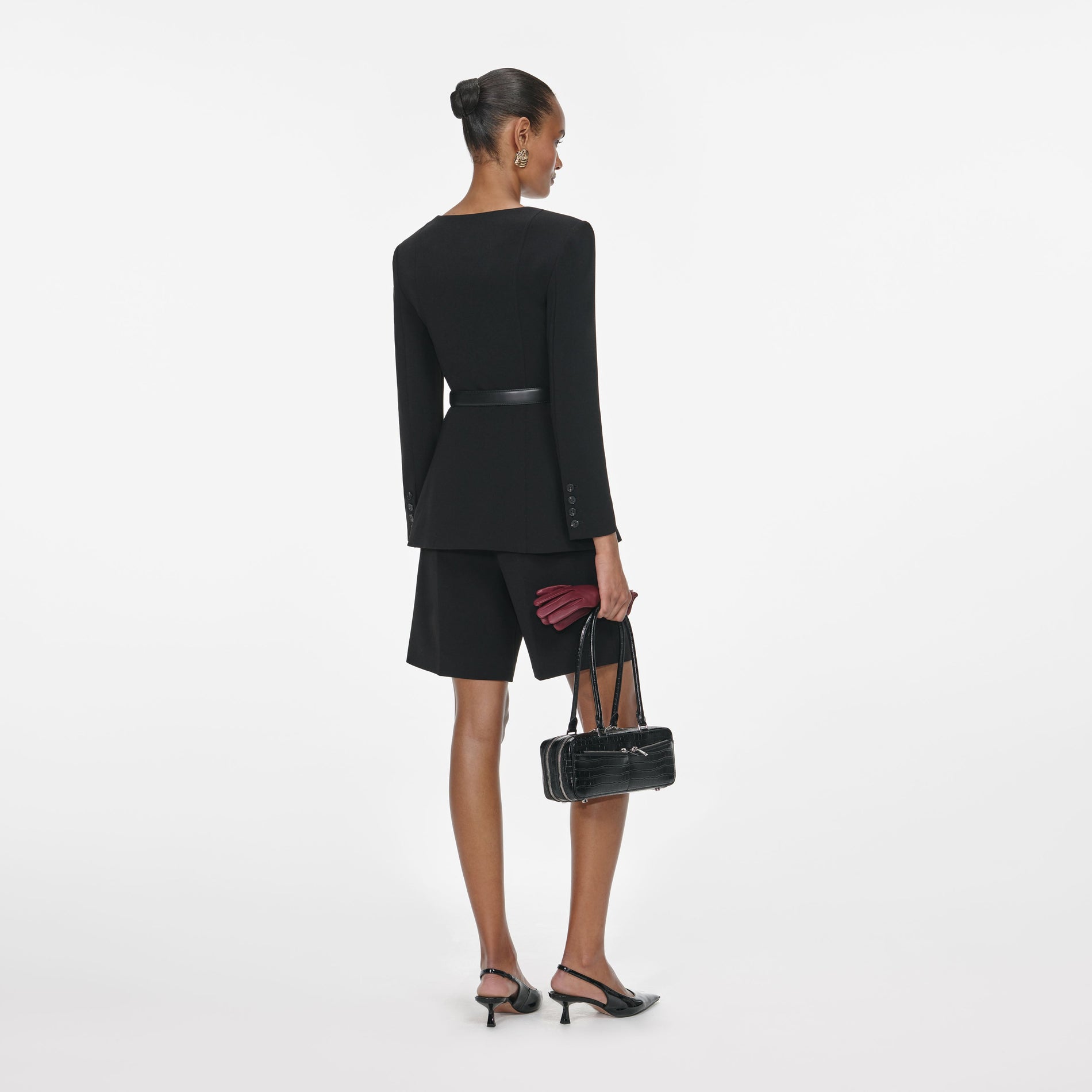 Back view of a woman wearing the Black Tailored Crepe Playsuit