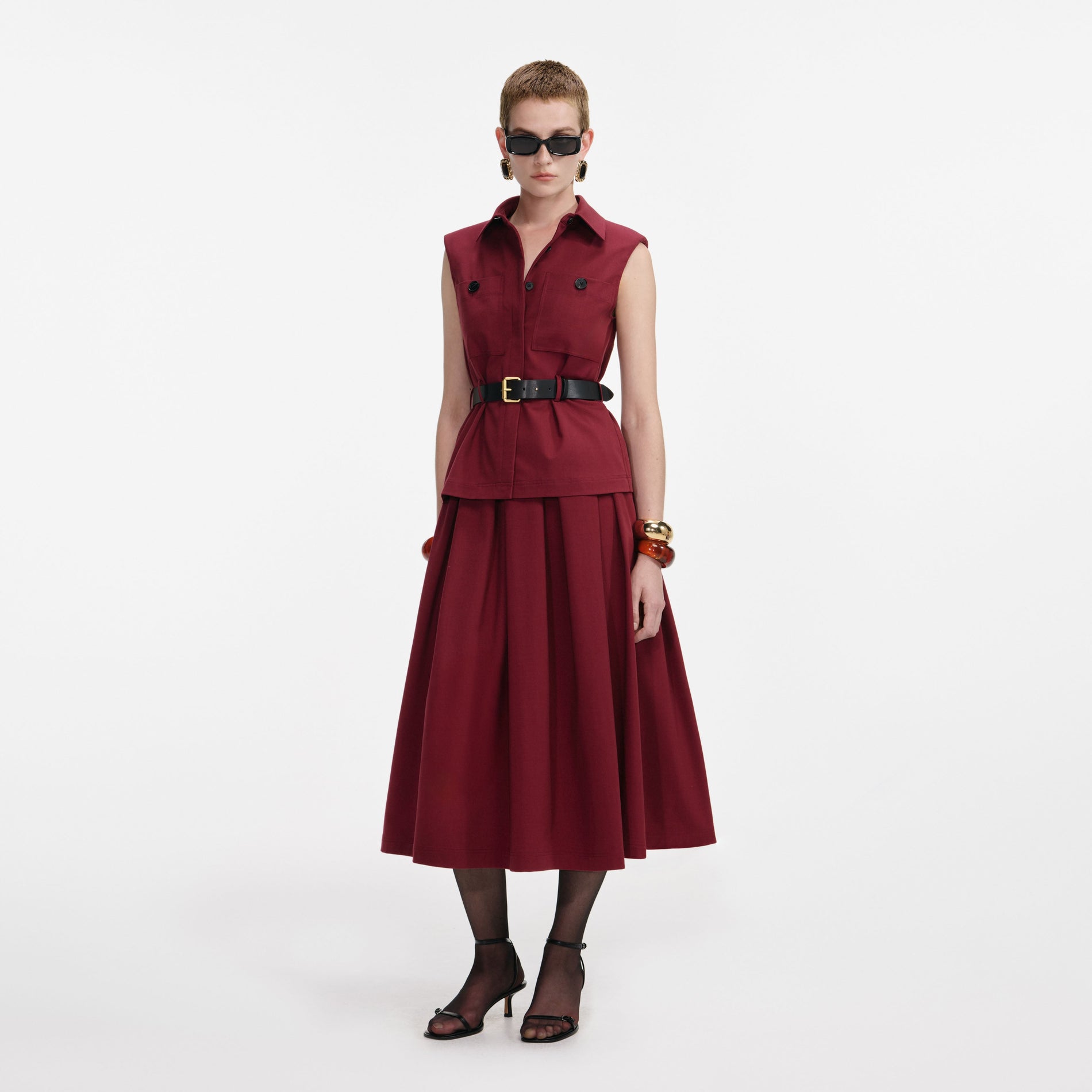 Side view of a woman wearing the Burgundy Twill Belted Midi Dress