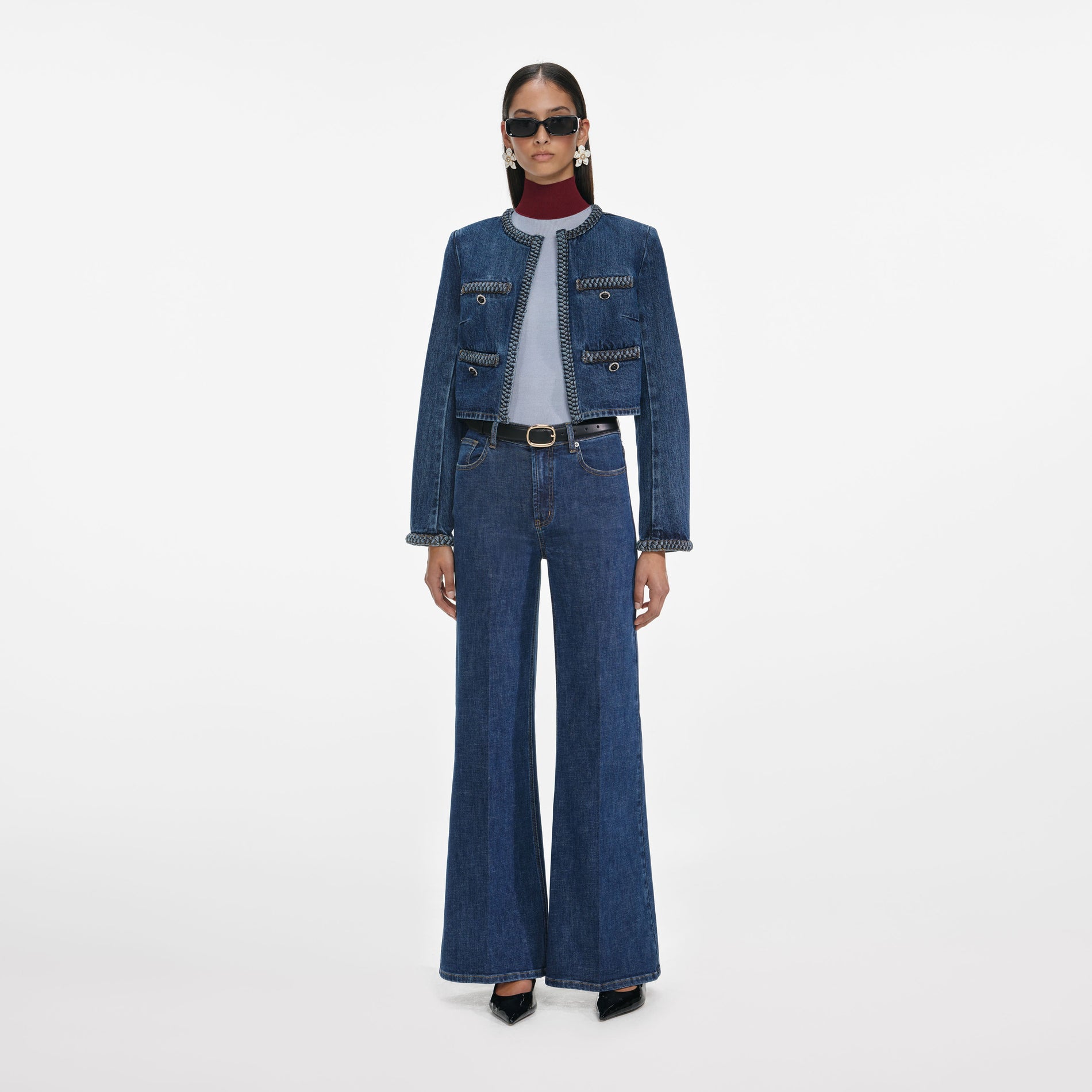 Front view of a woman wearing the Denim Braided Jacket