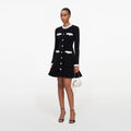 Black Chenille Knit Flower Trim Mini Dress