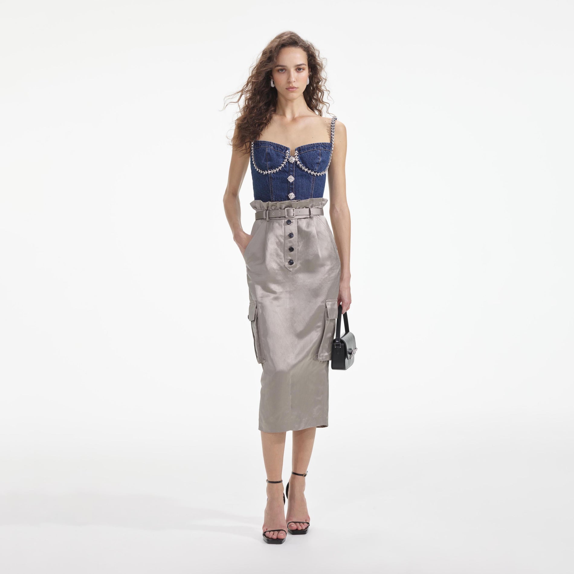 Front view of a woman wearing the Diamante Denim Top