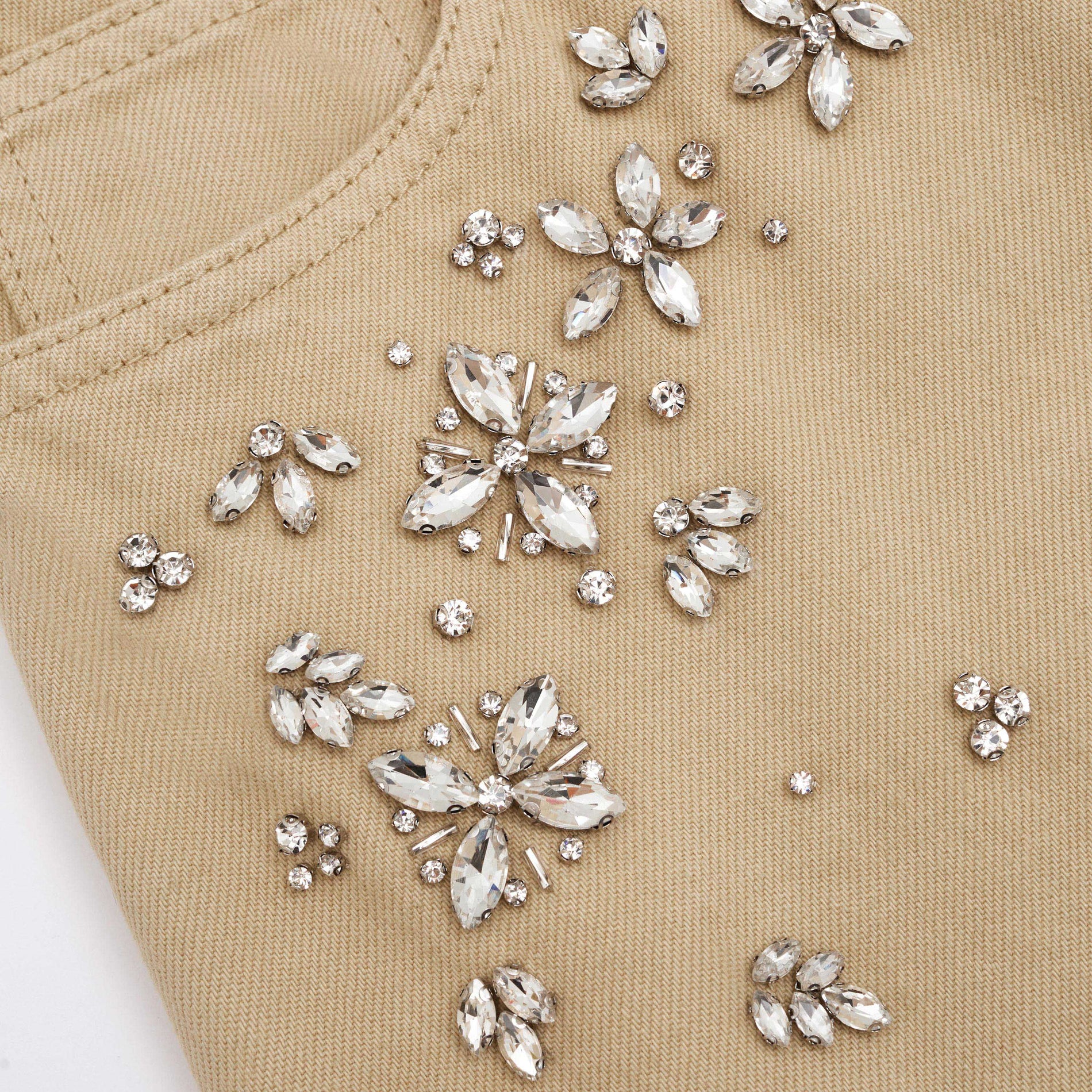 A close up of the fabric for the Embellished Denim Cargo Maxi Skirt
