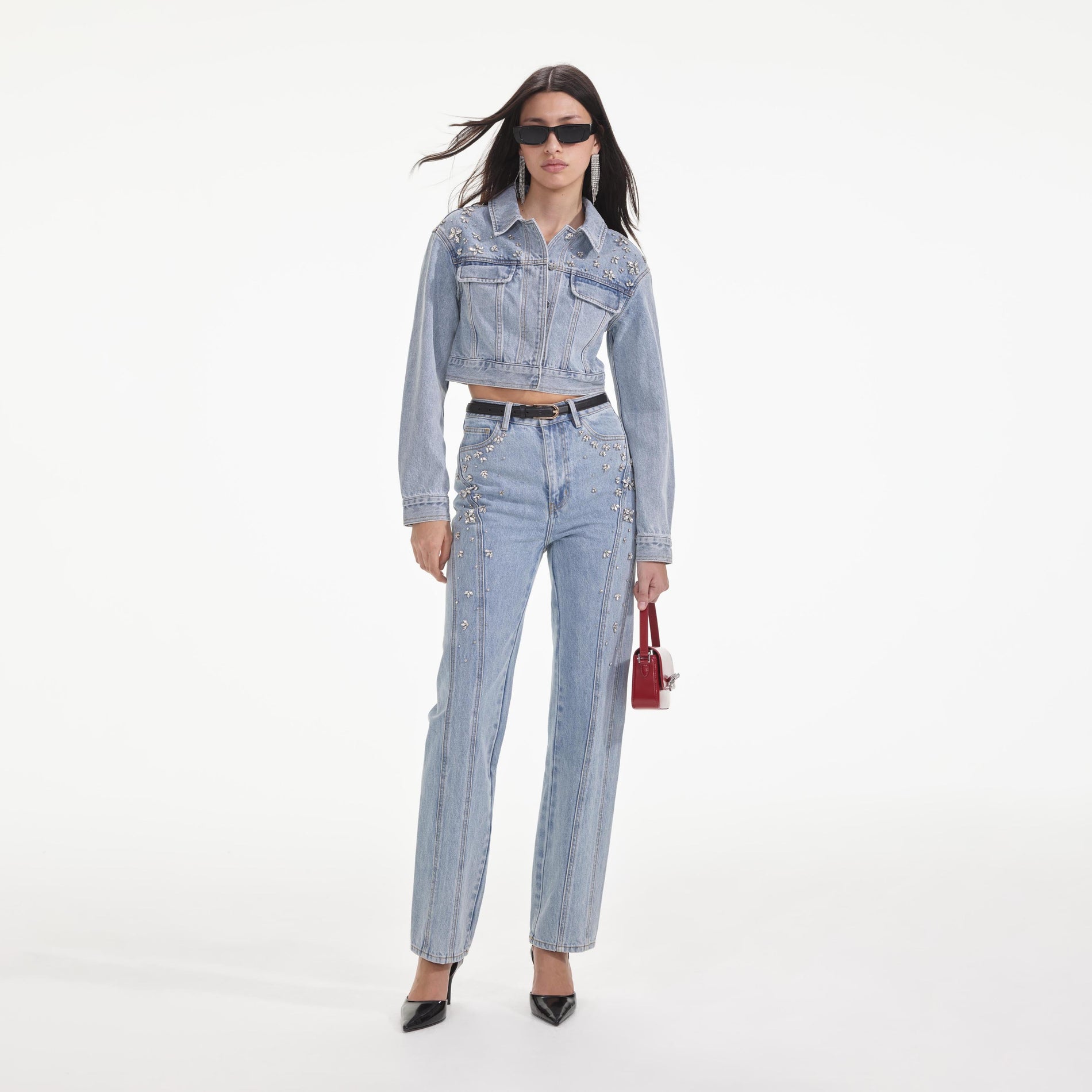 Front view of a woman wearing the Crystal Embellished Denim Jacket