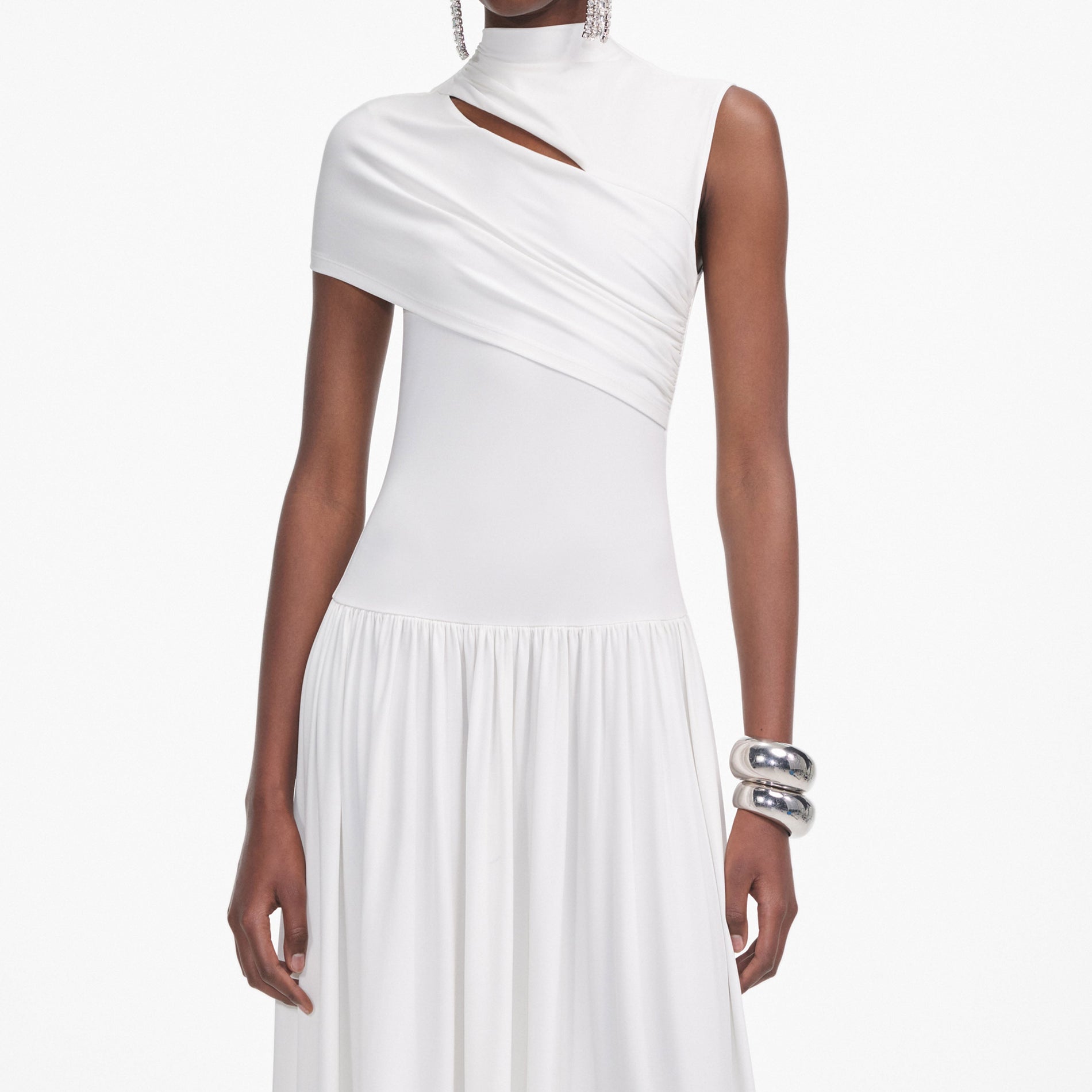 A close up of a woman wearing the White Jersey Cut Out Midi Dress