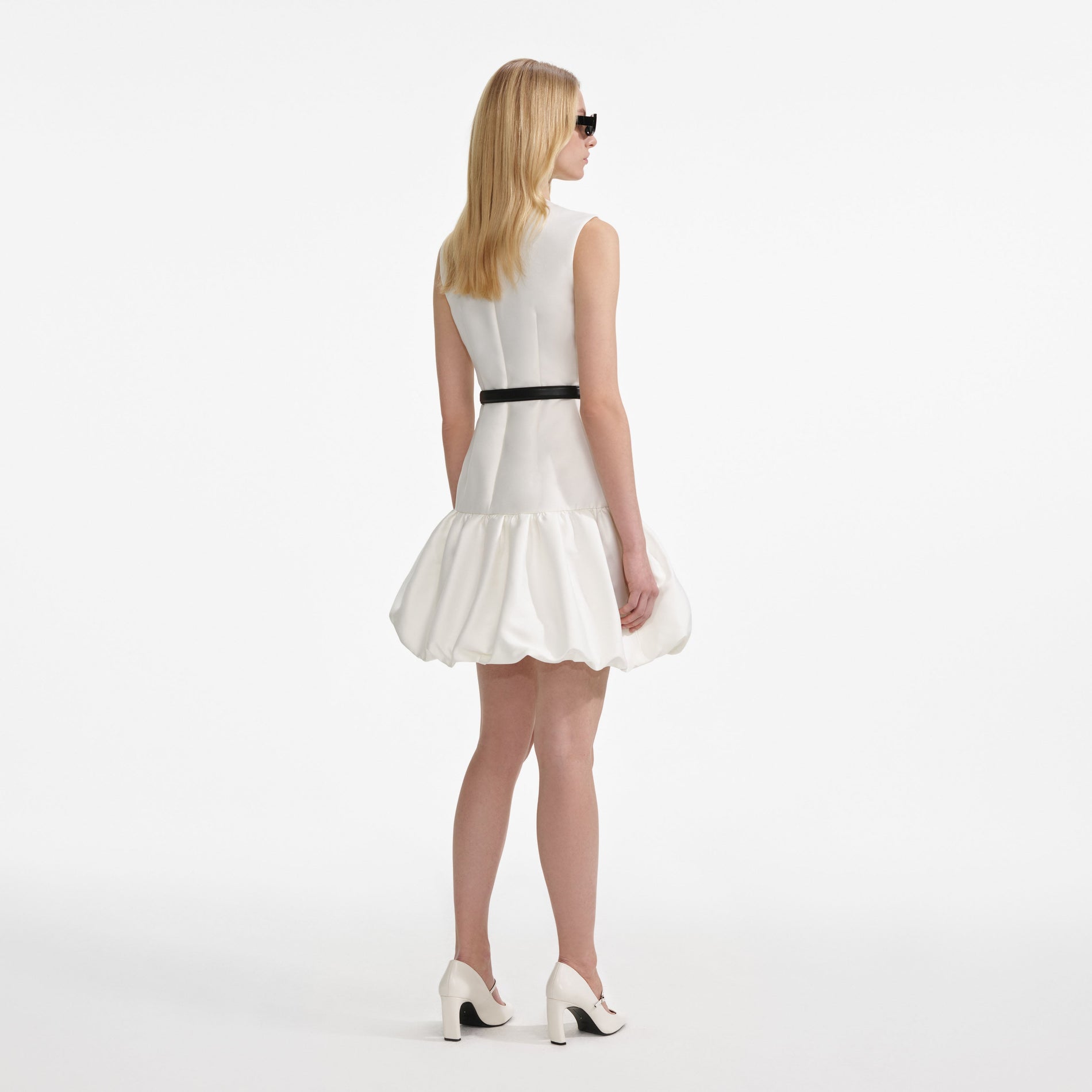 Back view of a woman wearing the Cream Taffeta Mini Dress