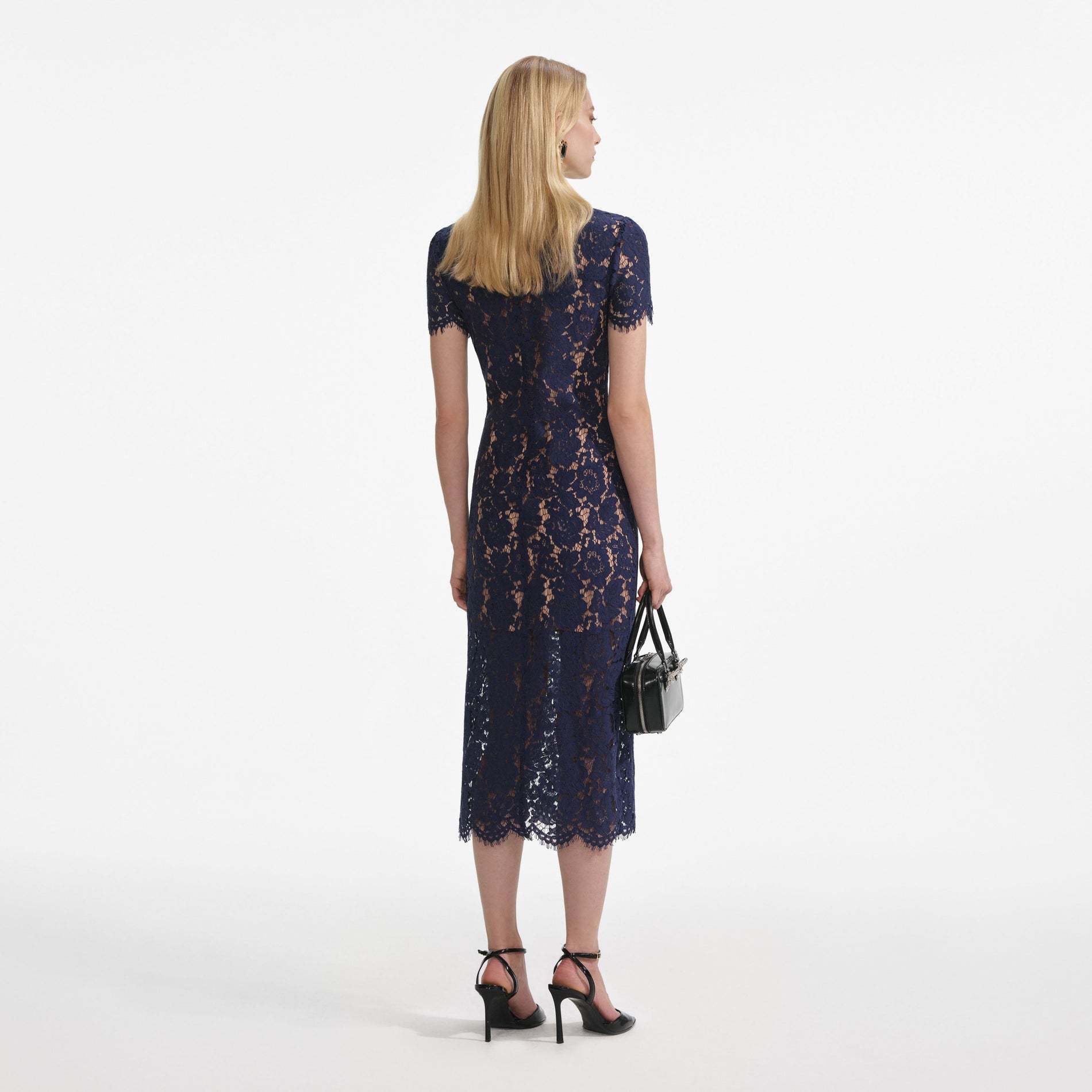 Back view of a woman wearing the Navy Lace Contrast Collar Midi Dress