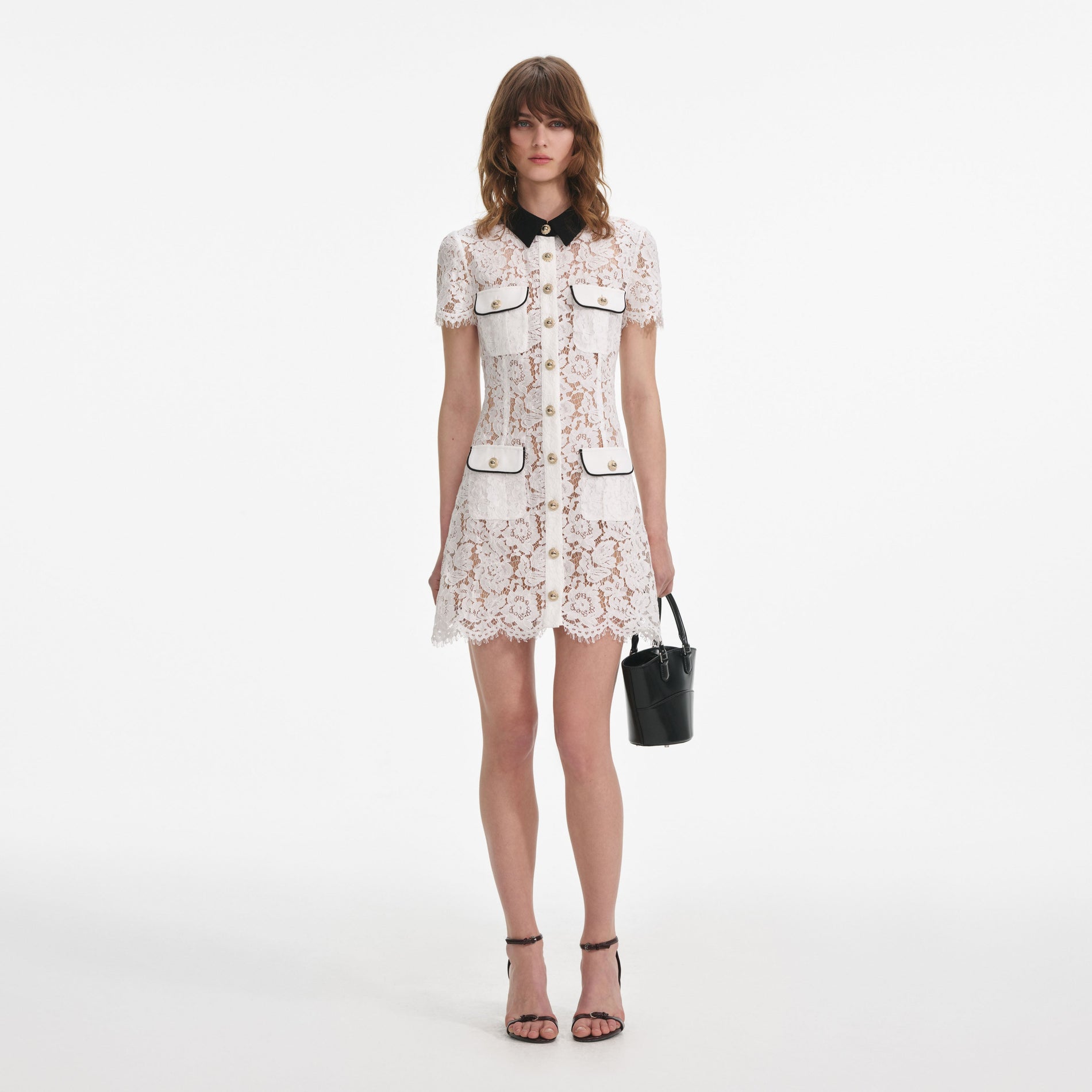 Front view of a woman wearing the White Lace Contrast Collar Mini Dress
