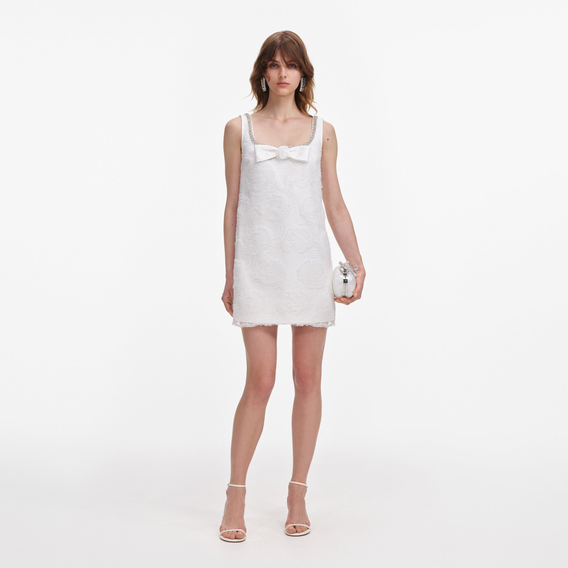 Front view of a woman wearing the White Tulle Lace Mini Dress