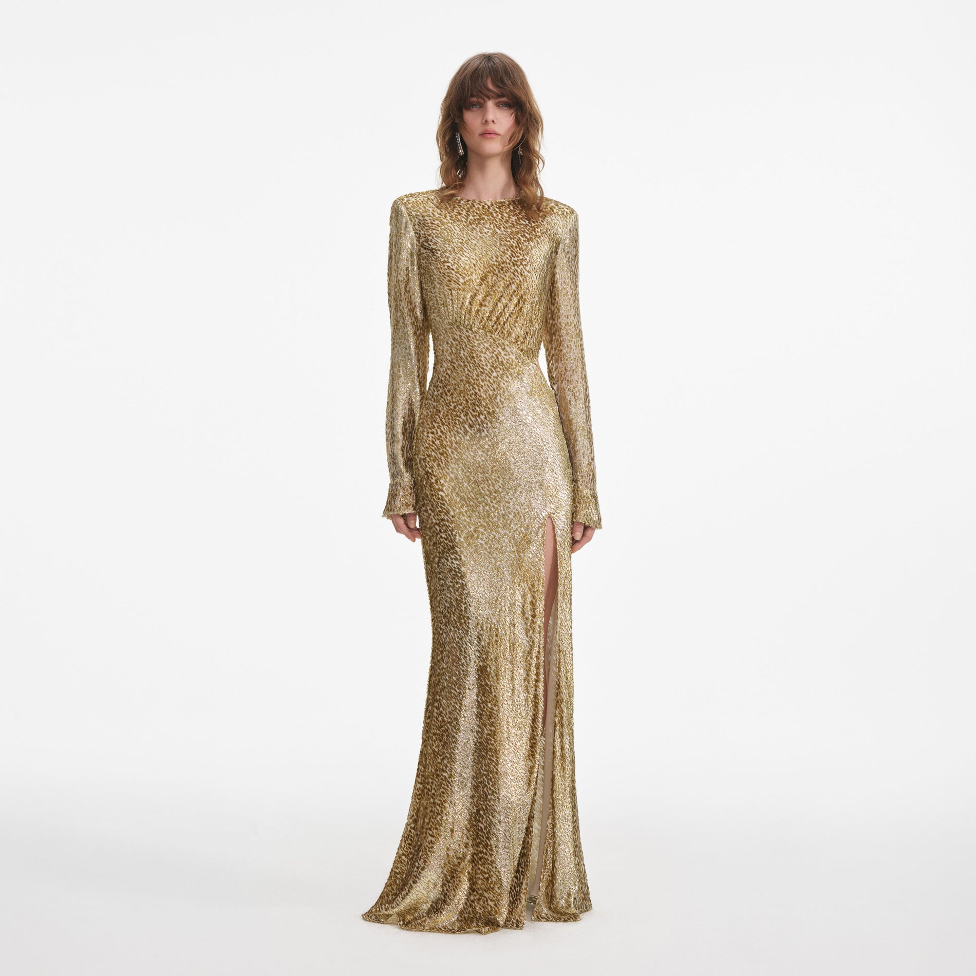 Front view of a woman wearing the Gold Fil Coupe Maxi Dress