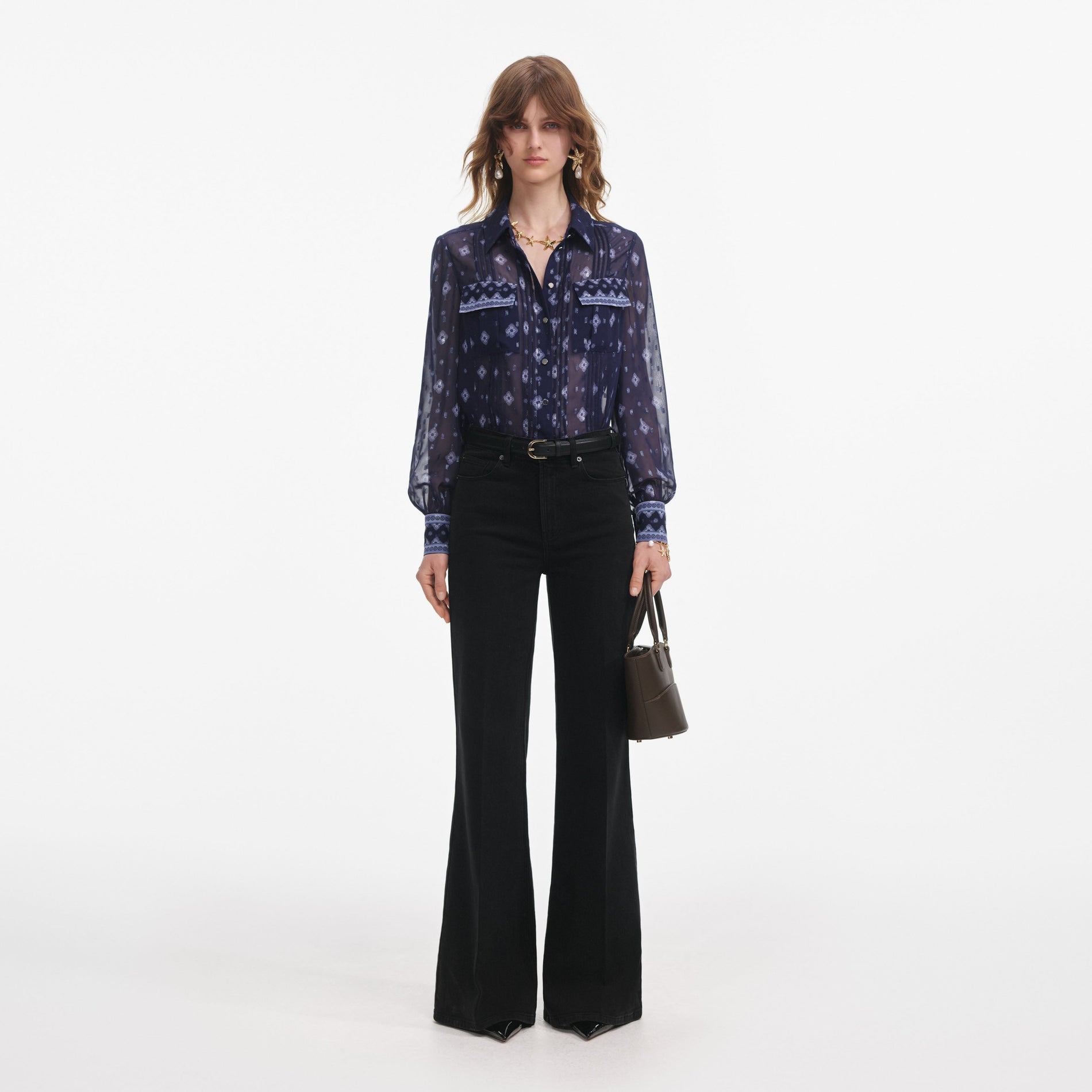 Front view of a woman wearing the Navy Printed Chiffon Blouse