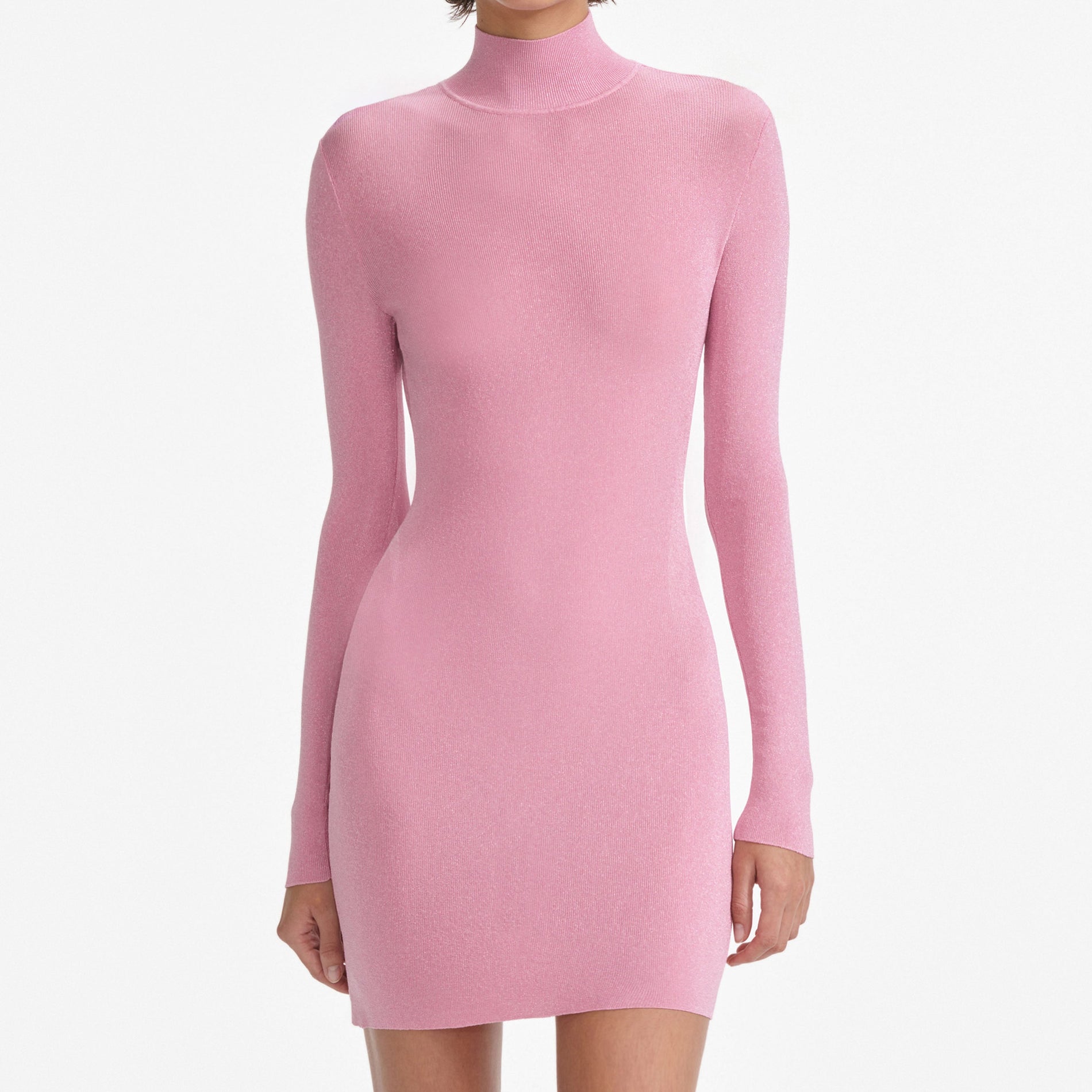 A close up of a woman wearing the Pink Viscose Knit Mini Dress