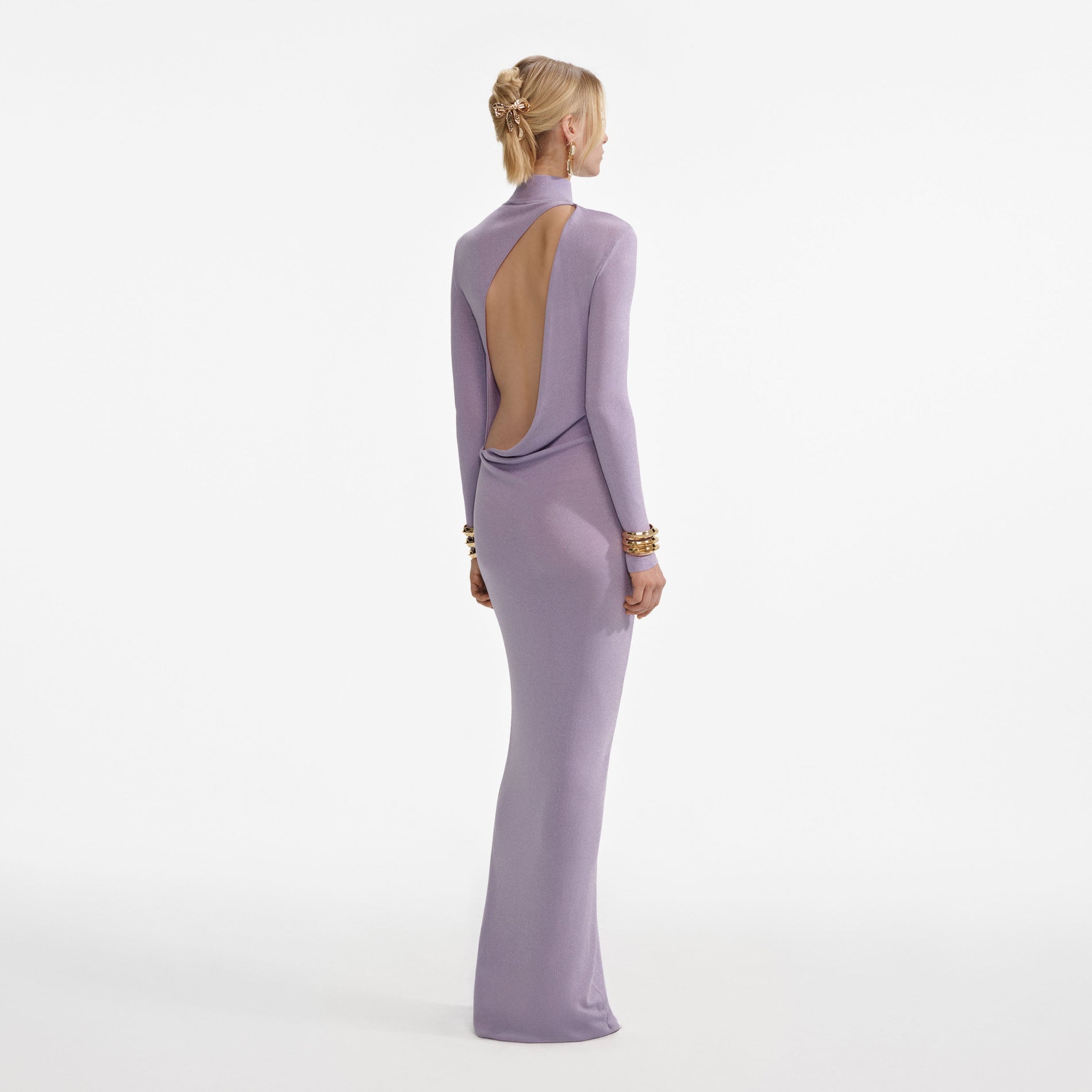 Back view of a woman wearing the Lilac Viscose Knit Maxi Dress