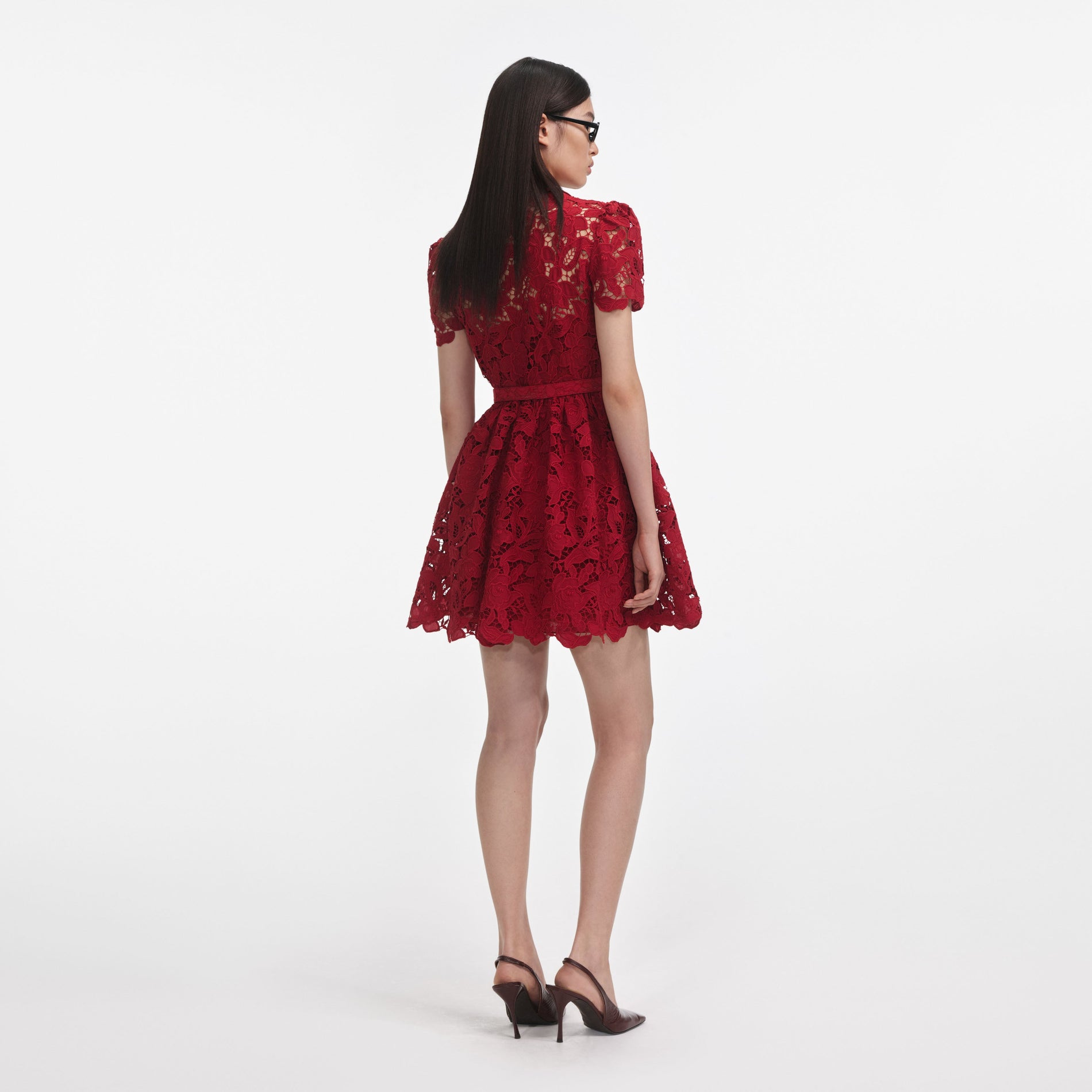 Back view of a woman wearing the Burgundy Lace Collared Mini Dress