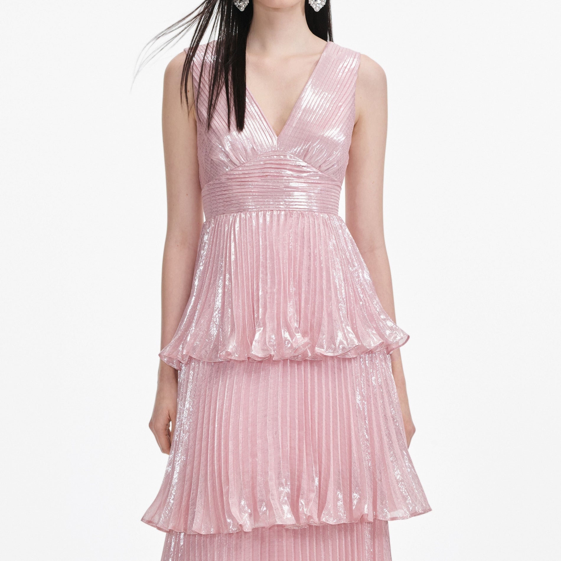 A close up of a woman wearing the Pink Metallic Tiered Maxi Dress
