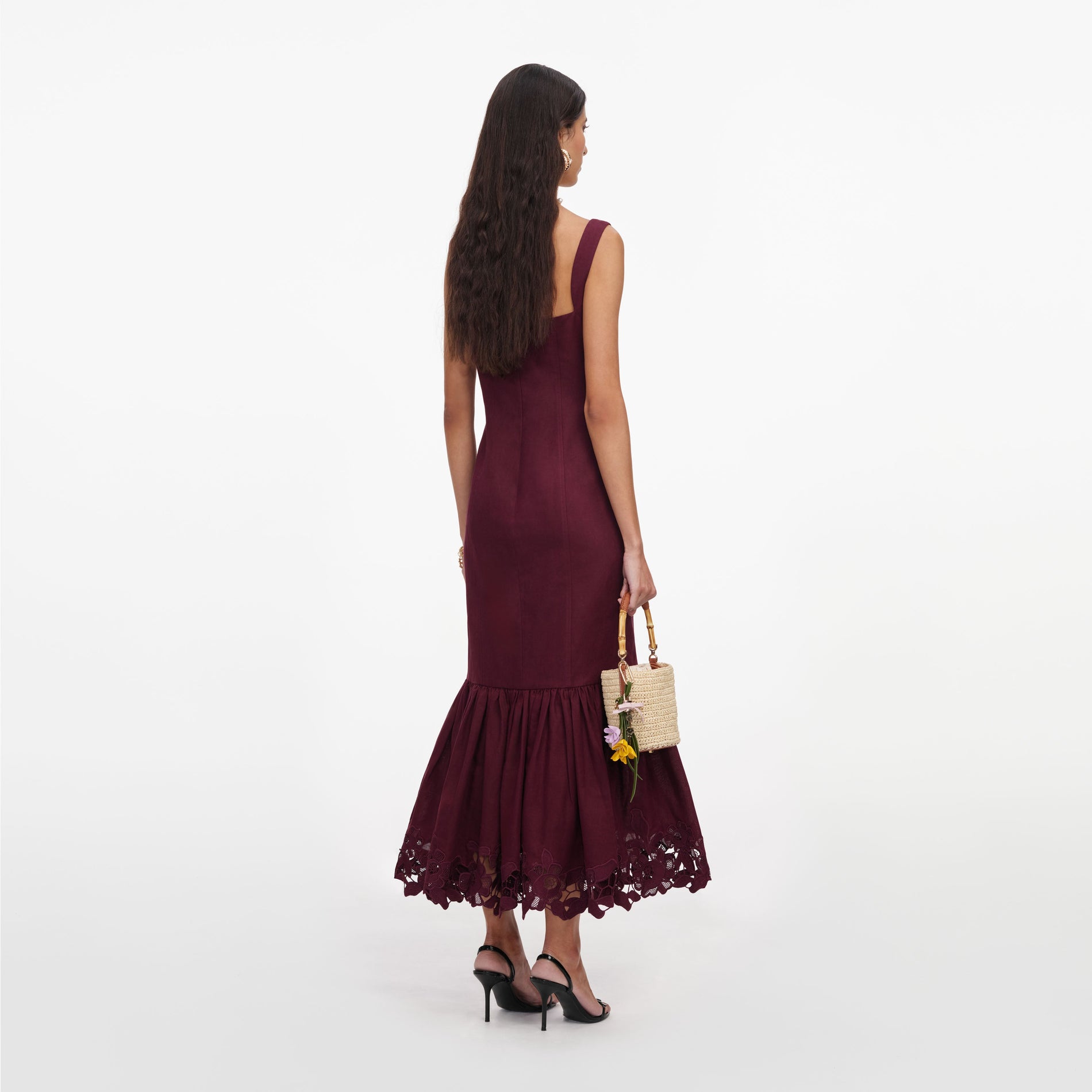 Back view of a woman wearing the Plum Linen Blend Lace Midi Dress