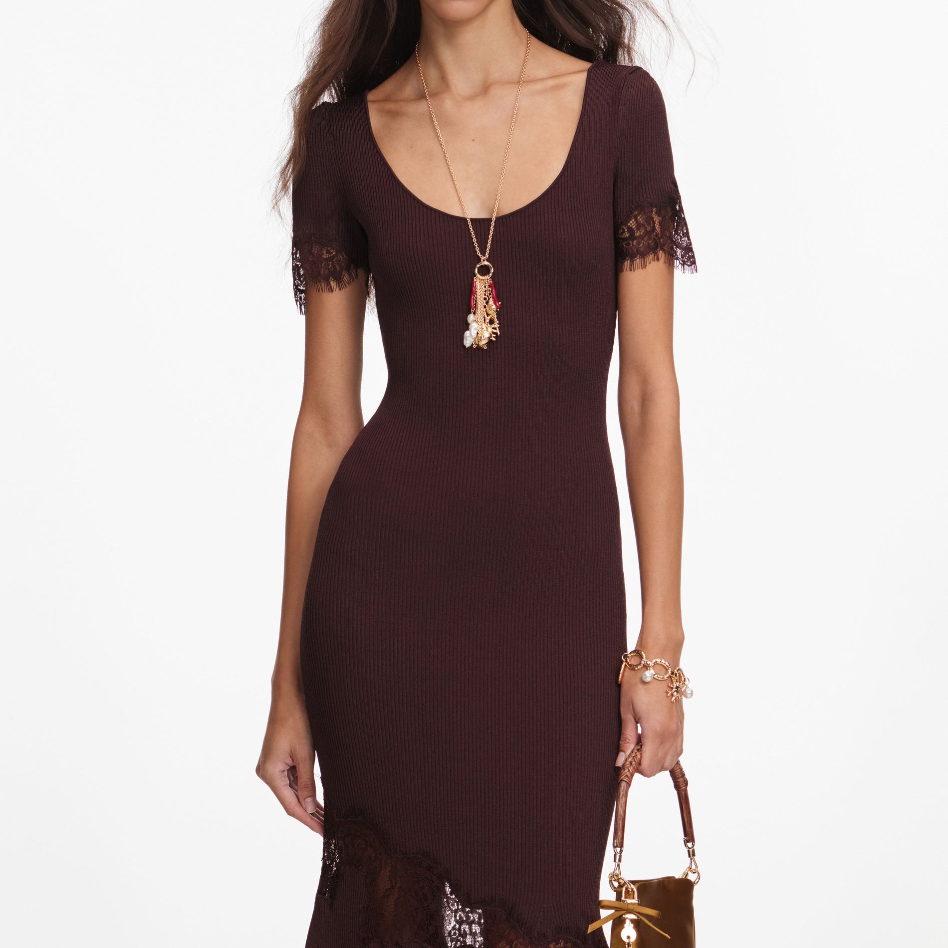 A close up of a woman wearing the Brown Ribbed Knit Midi Dress