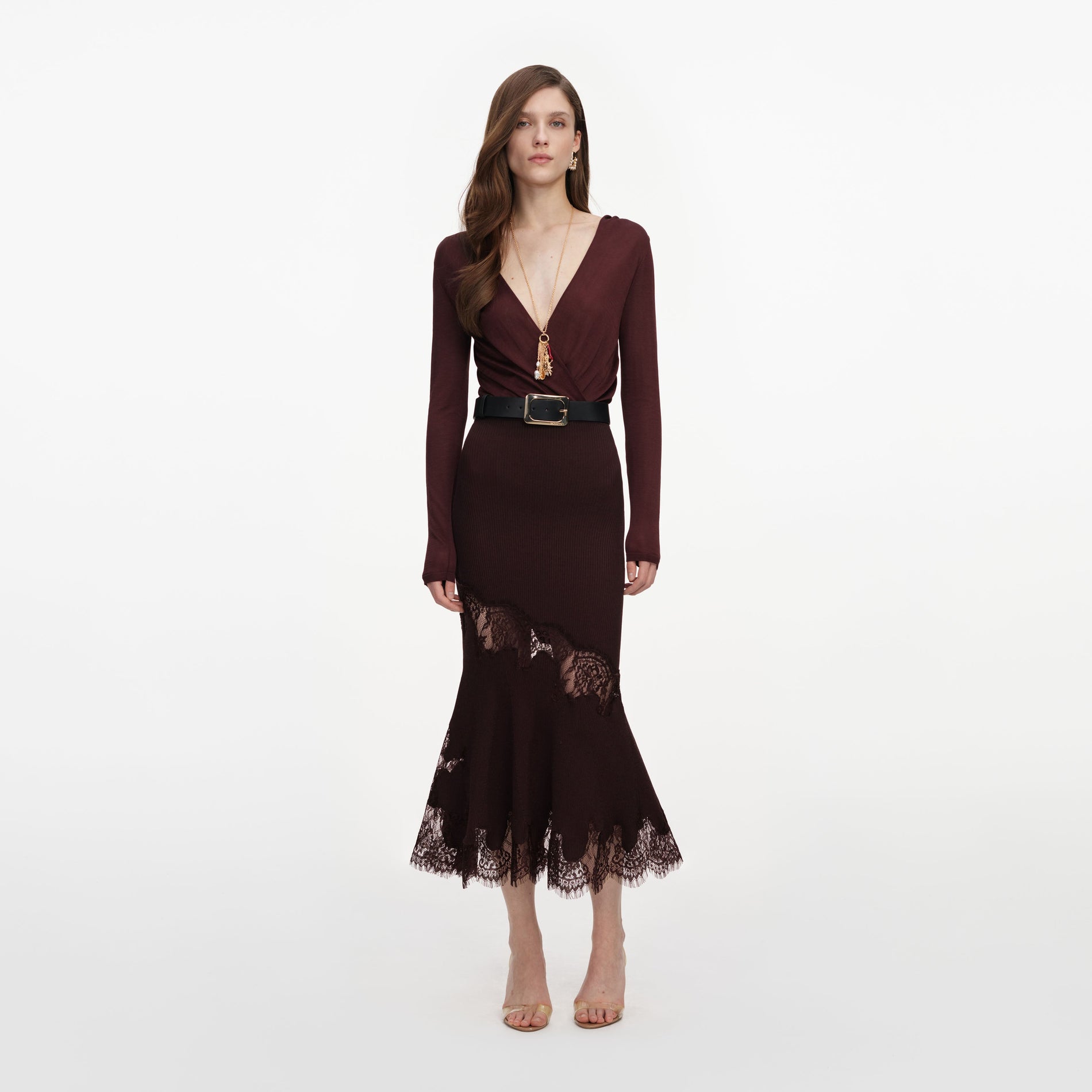 Front view of a woman wearing the Brown Ribbed Knit Midi Skirt