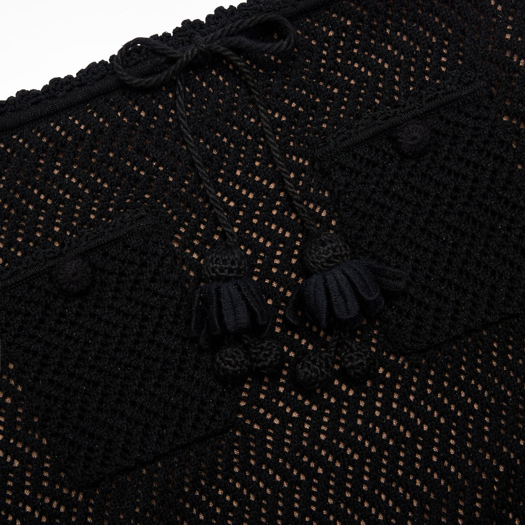 A close up of the fabric for the Black Crochet Knit Midi Skirt
