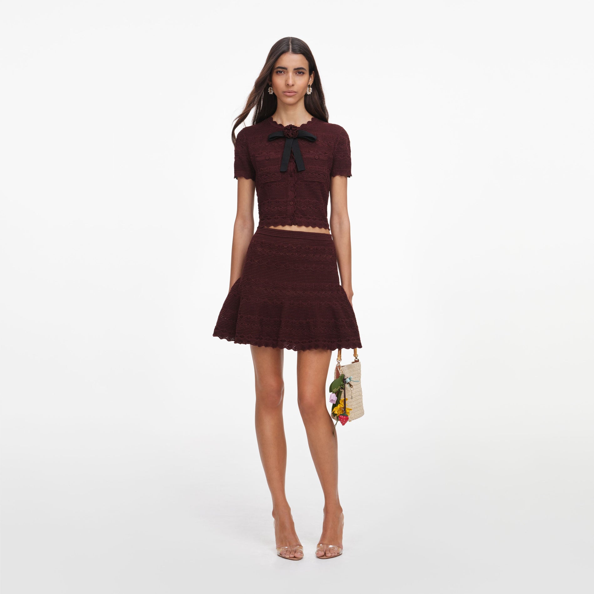 Front view of a woman wearing the Brown Pointelle Knit Mini Skirt