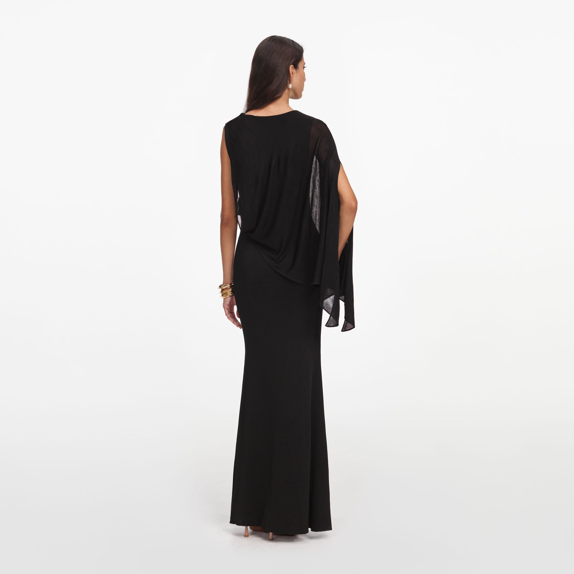 Back view of a woman wearing the Black Viscose Knit One Shoulder Maxi Dress