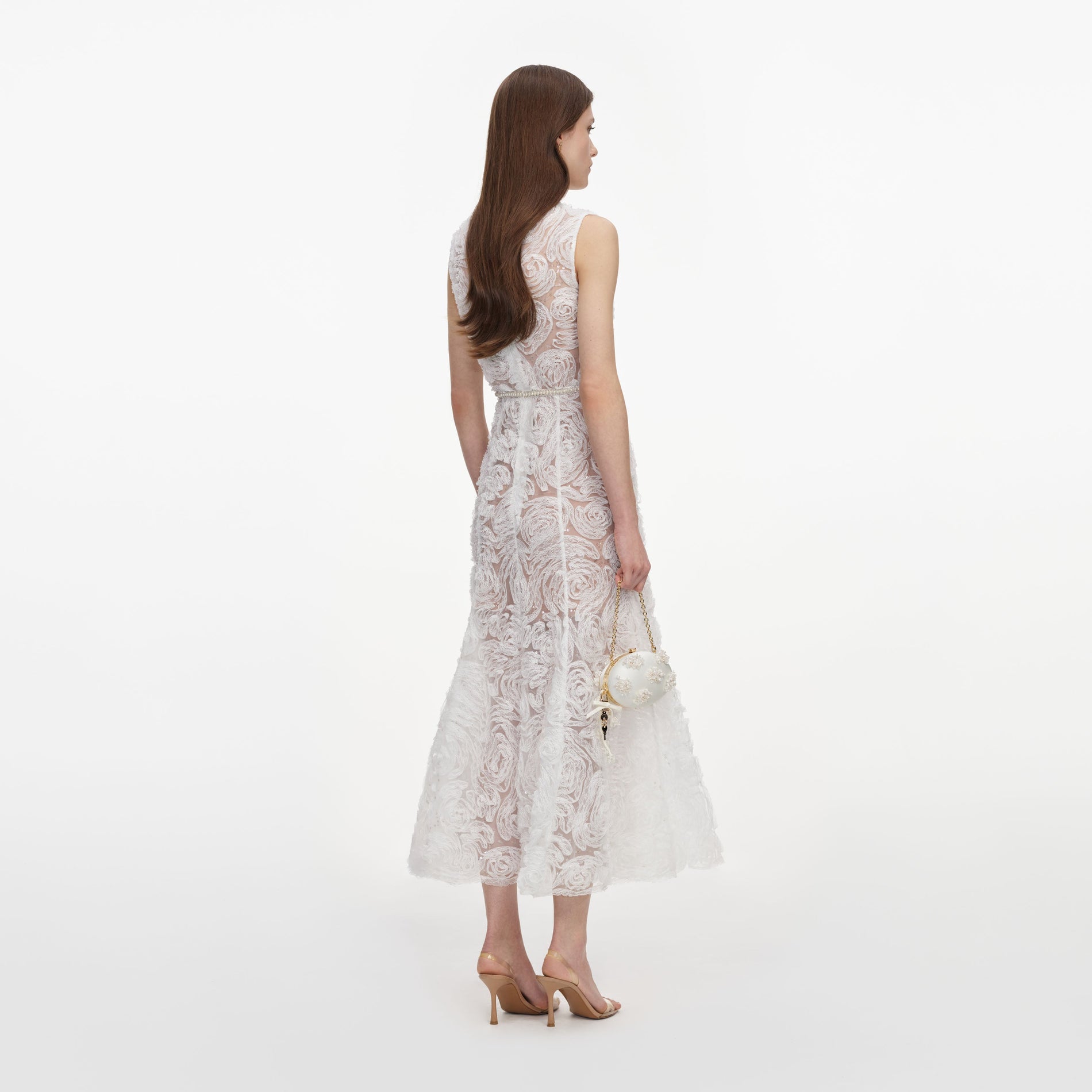 Back view of a woman wearing the White Tulle Lace Midi Dress