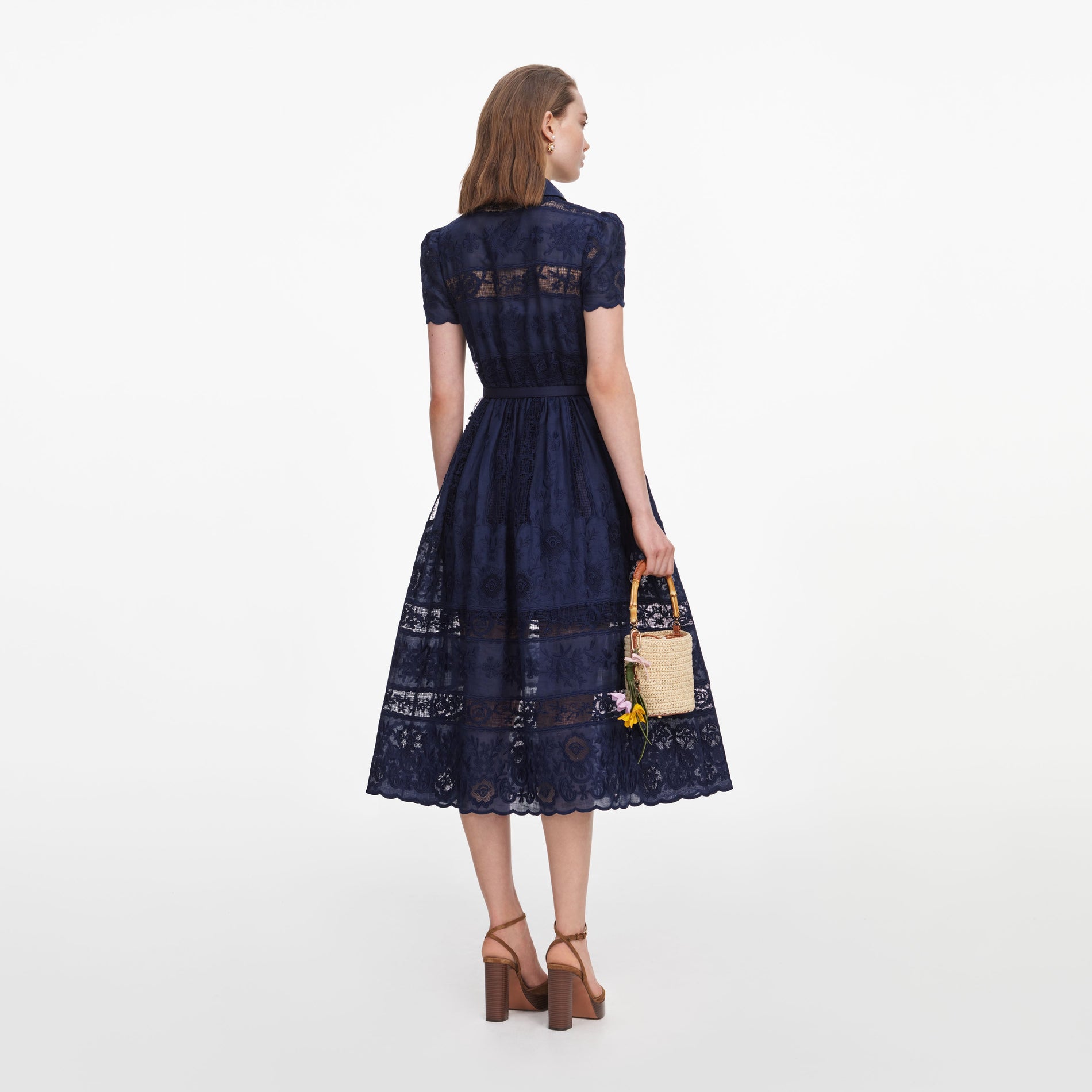 Back view of a woman wearing the Navy Ramie Collared Midi Dress