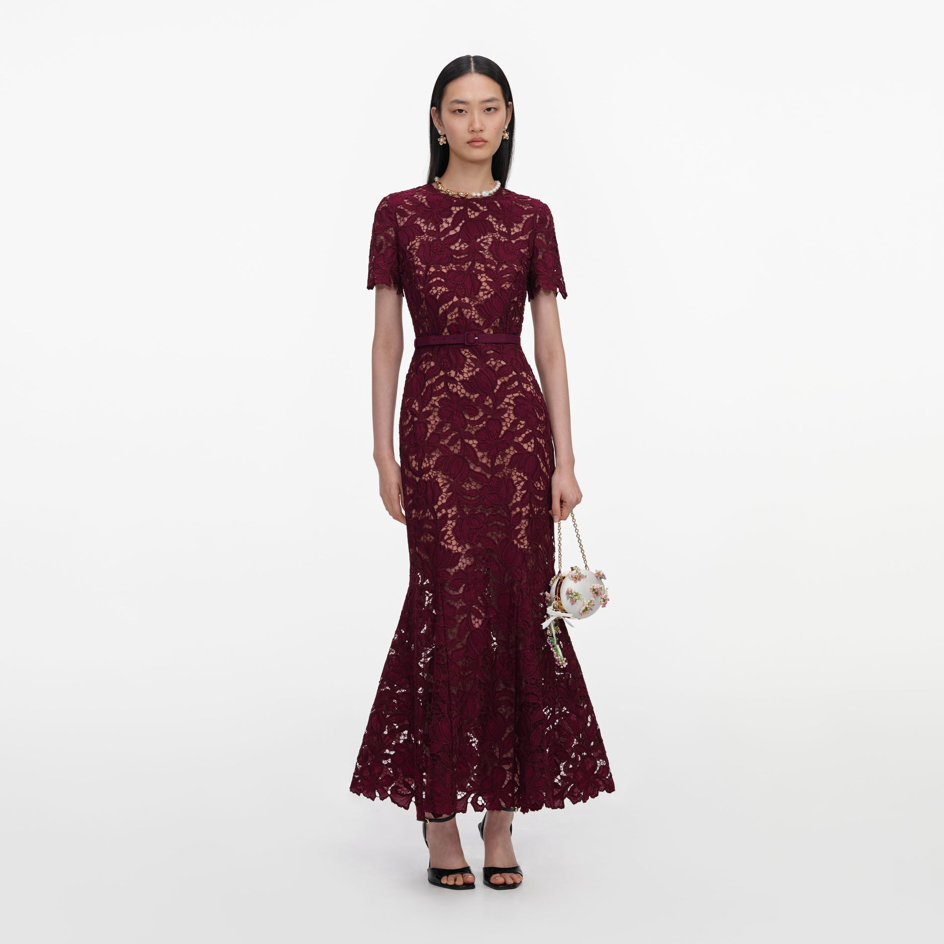 Front view of a woman wearing the Burgundy Lace Midi Dress