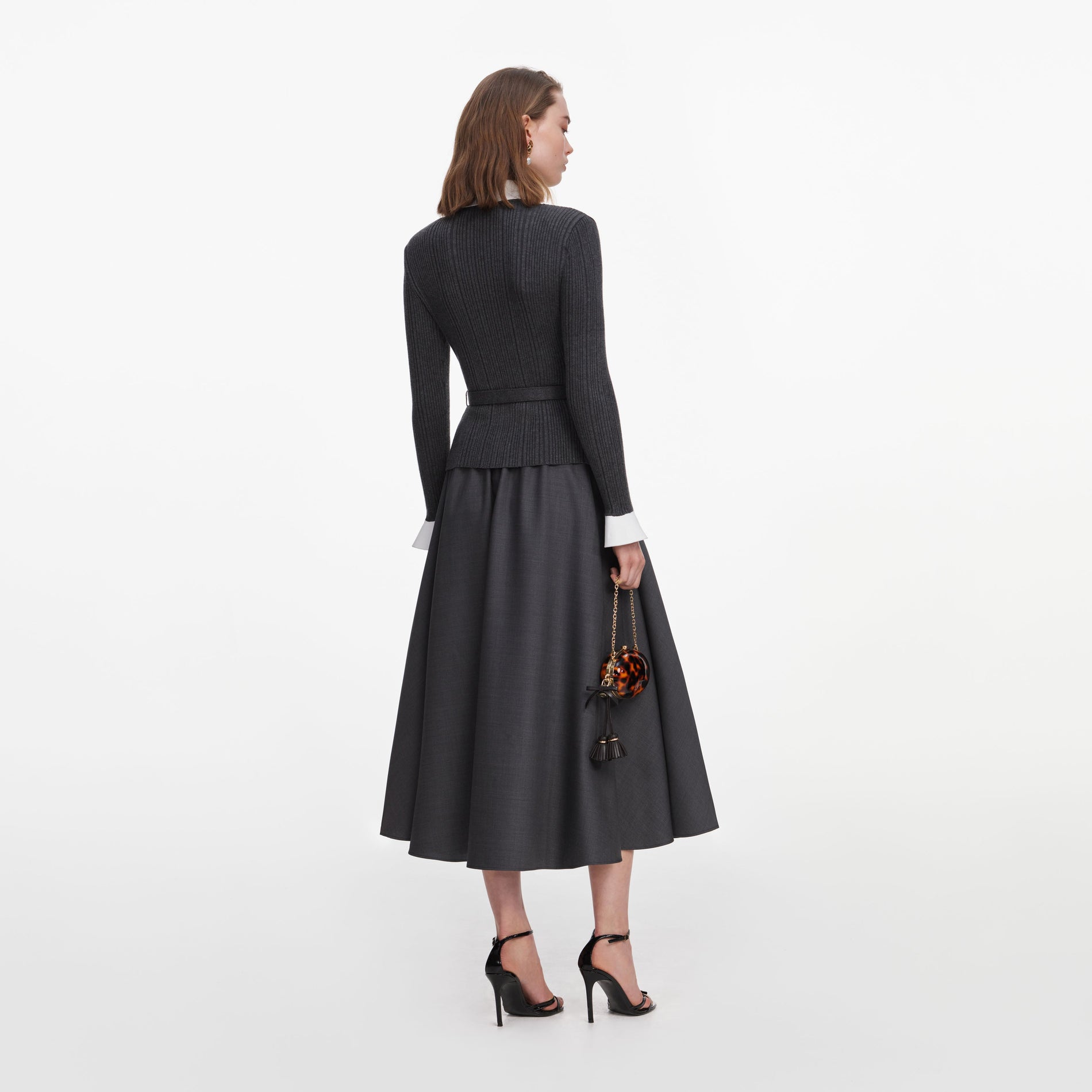 Back view of a woman wearing the Grey Knit Twill Midi Dress