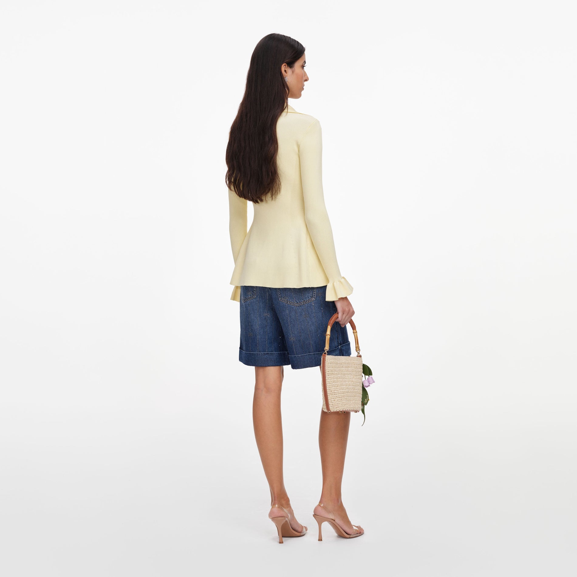 Back view of a woman wearing the Yellow Viscose Knit Tie Top