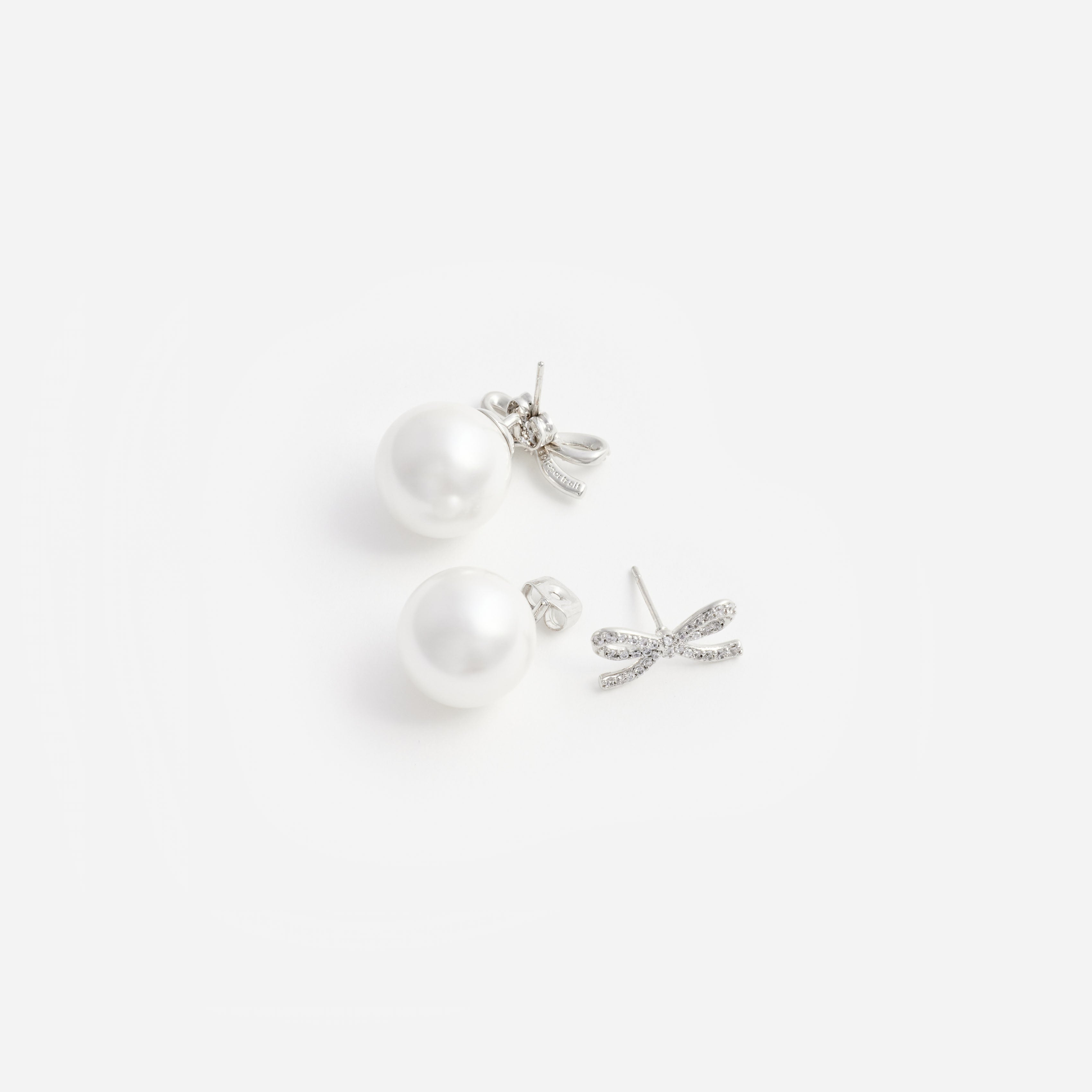 Crystal Bow Pearl Back Earrings