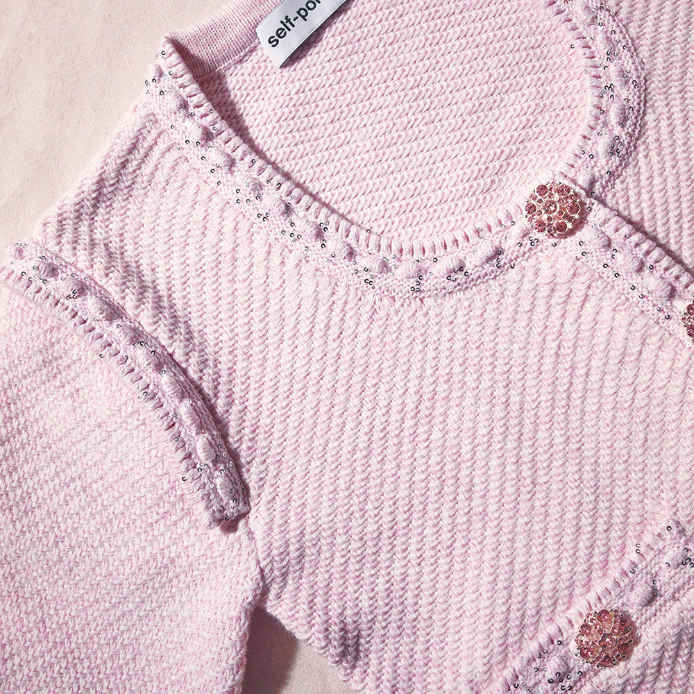 A close up of the fabric for the Pink Knit Crop Cardigan