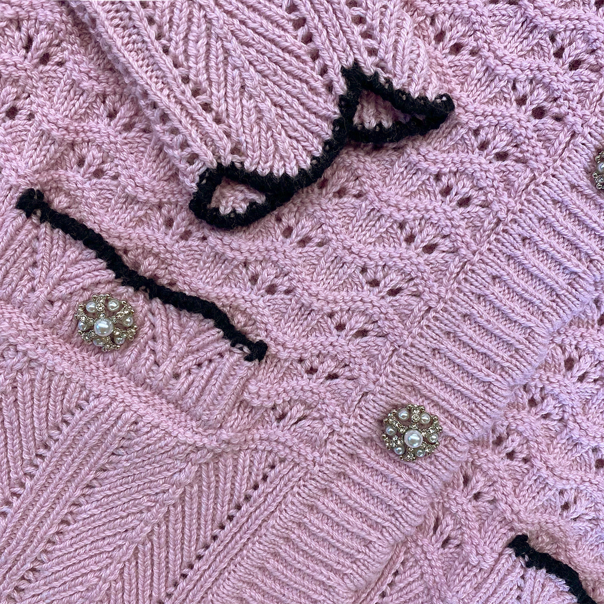 A close up of the fabric for the Lilac Crochet Knit Cardigan