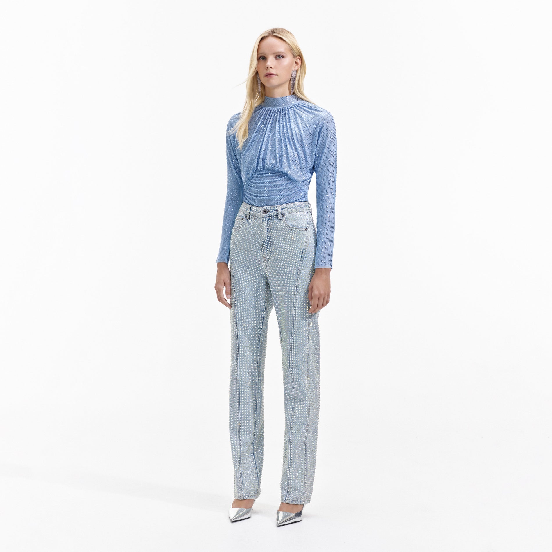 Side view of a woman wearing the Light Blue Rhinestone Mesh Top