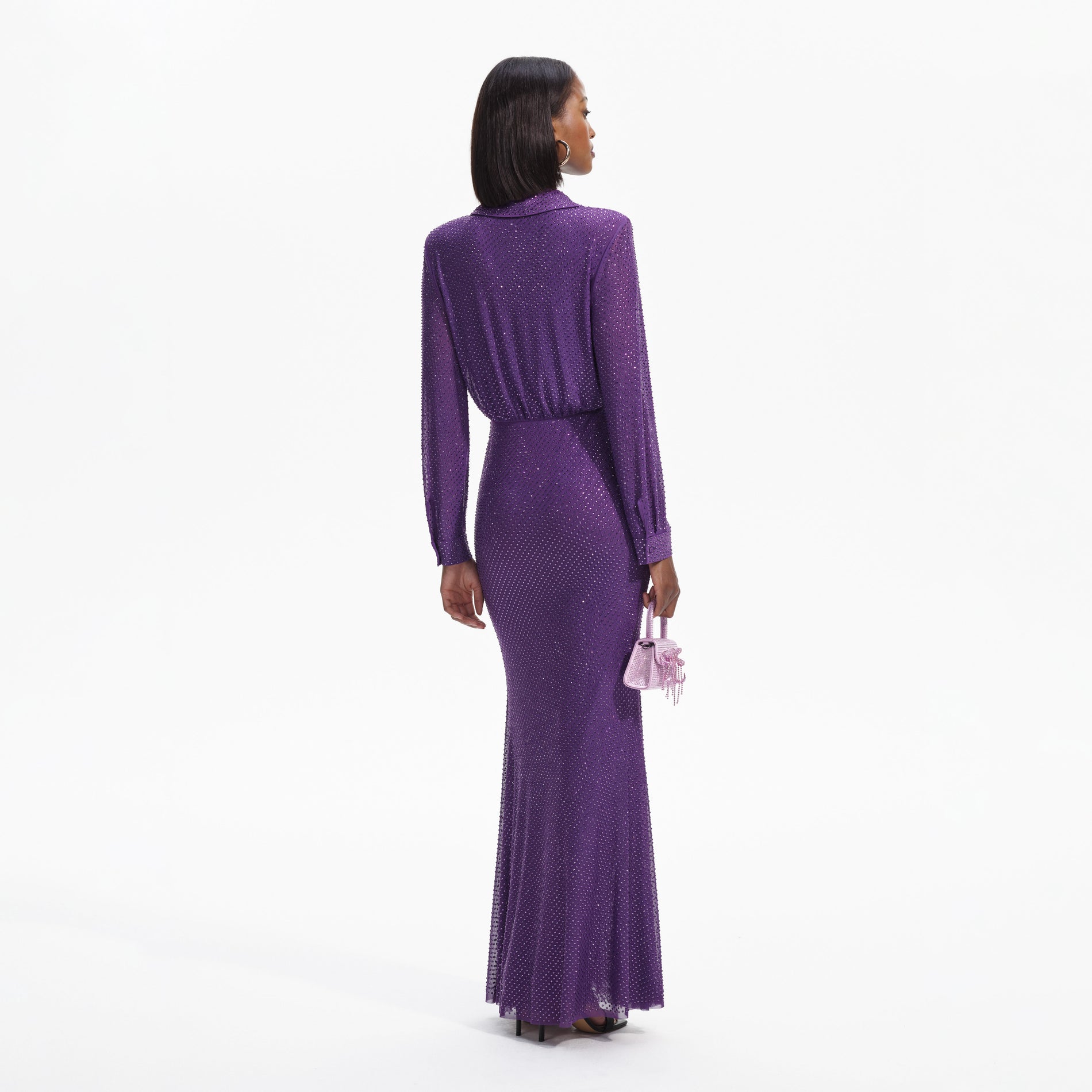 Back view of a woman wearing the Purple Rhinestone Mesh Maxi Dress