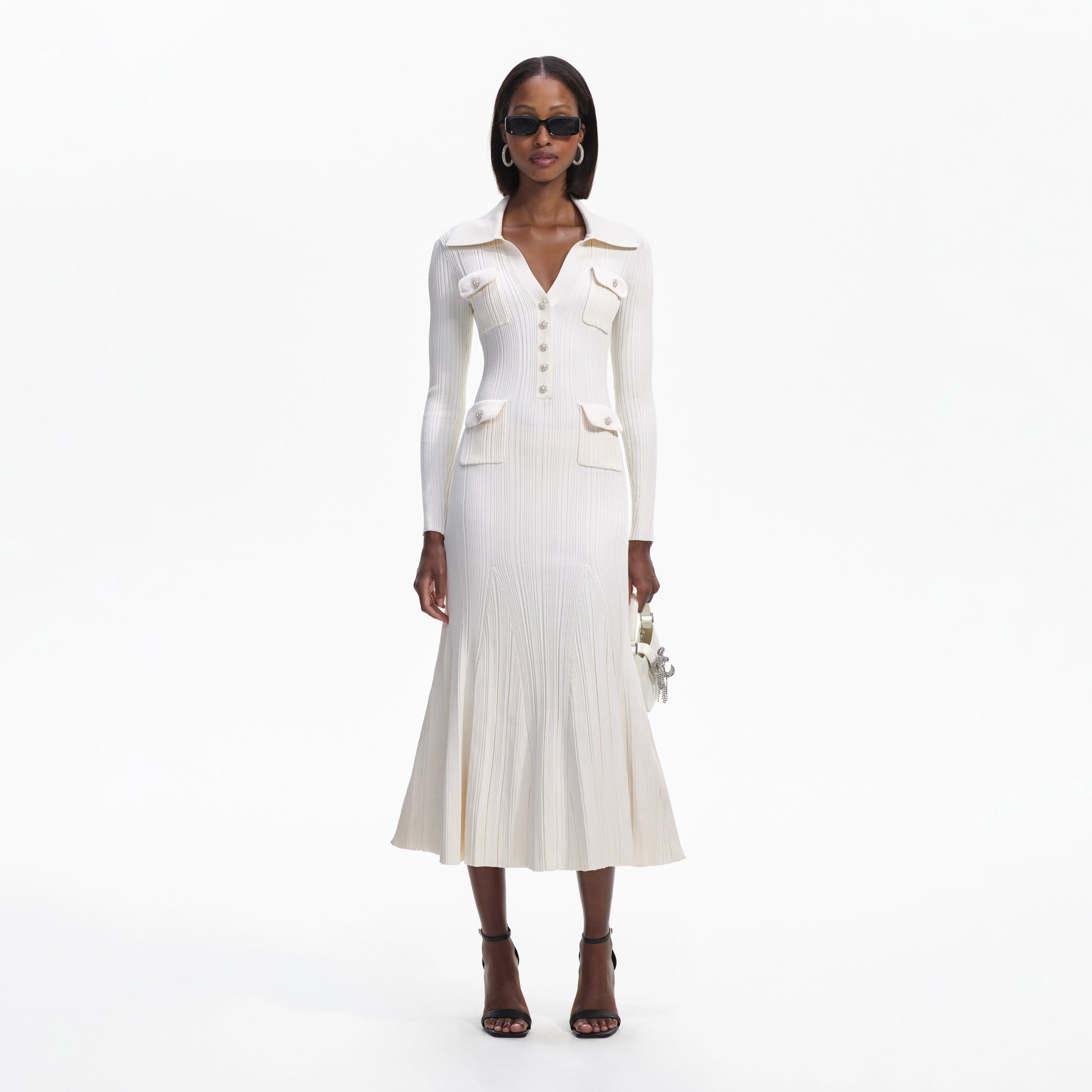 Front view of a woman wearing the Cream Knit Midi Dress