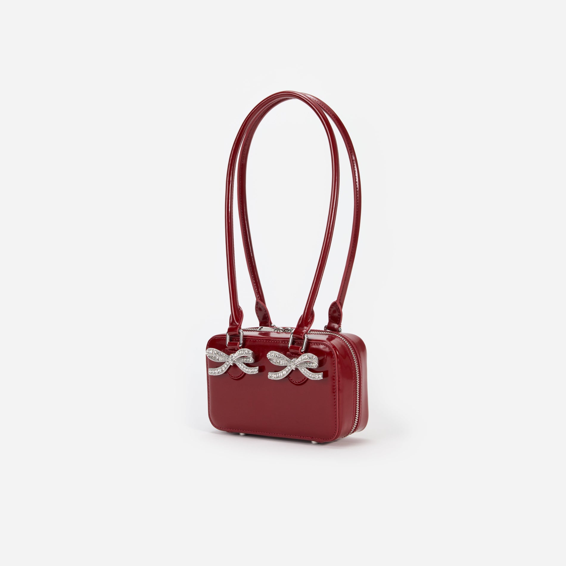 Side view of a woman wearing the Burgundy Leather Shoulder Bag
