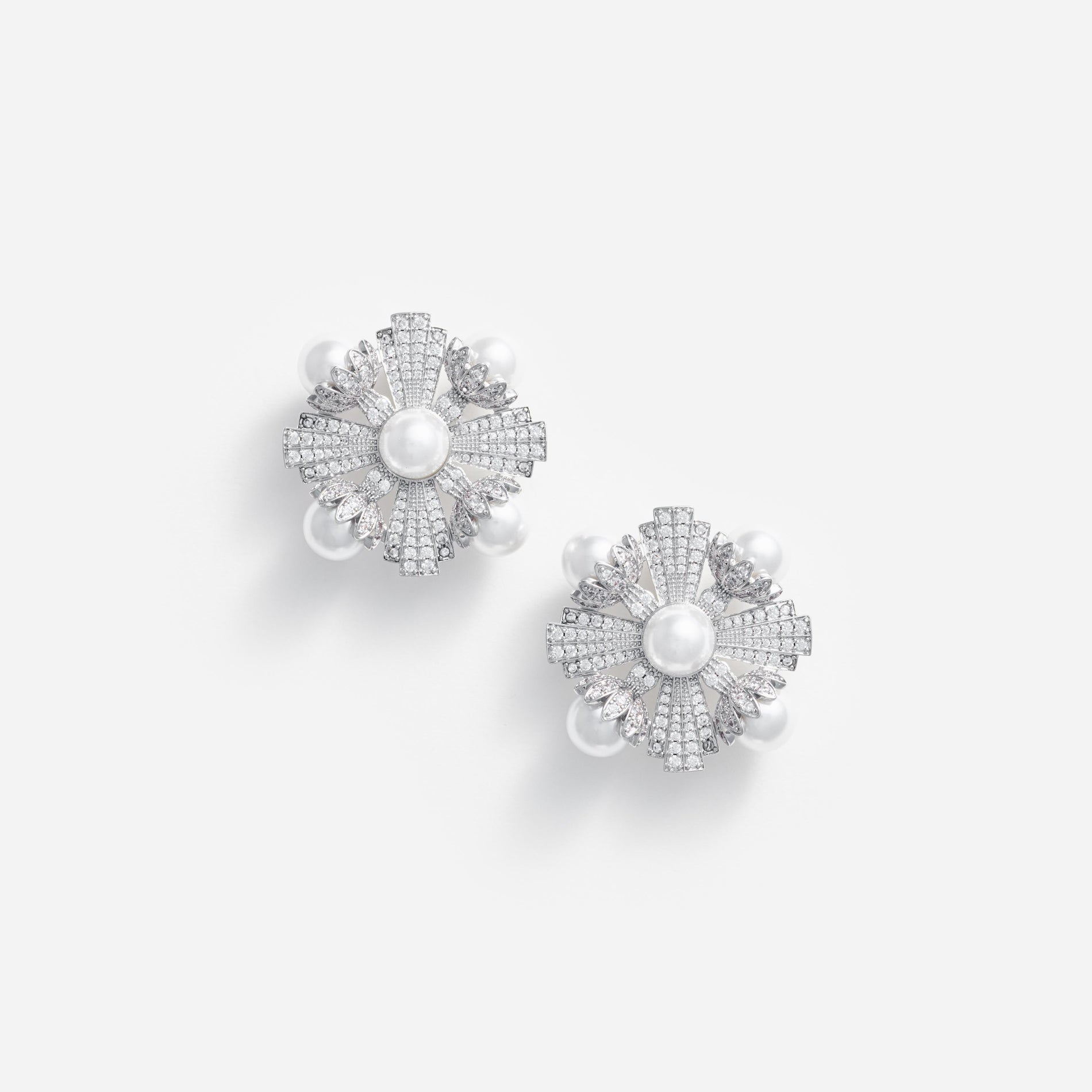Front view of a woman wearing the Large Silver Encrusted Earrings