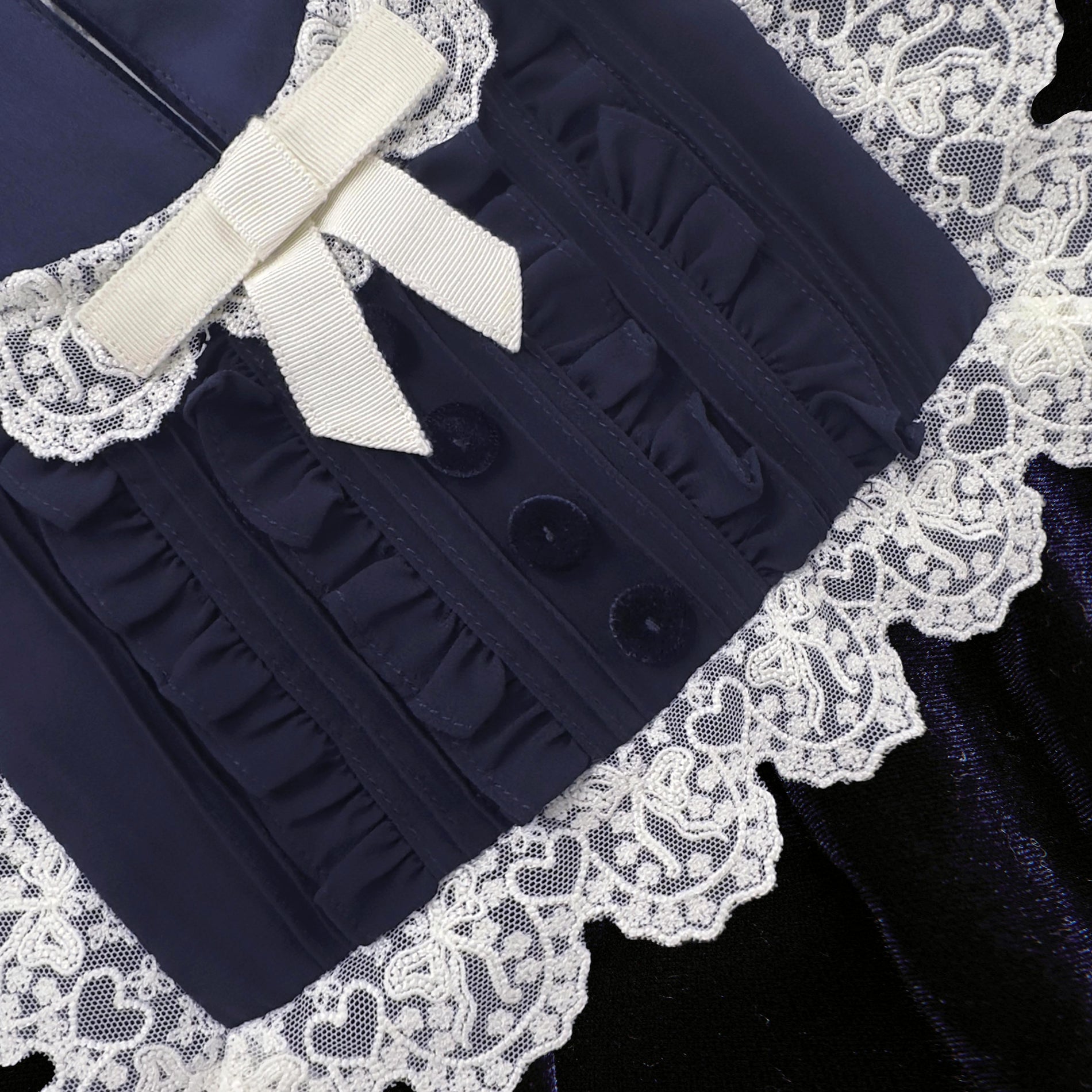 Back view of a woman wearing the Navy Velvet Mini Dress