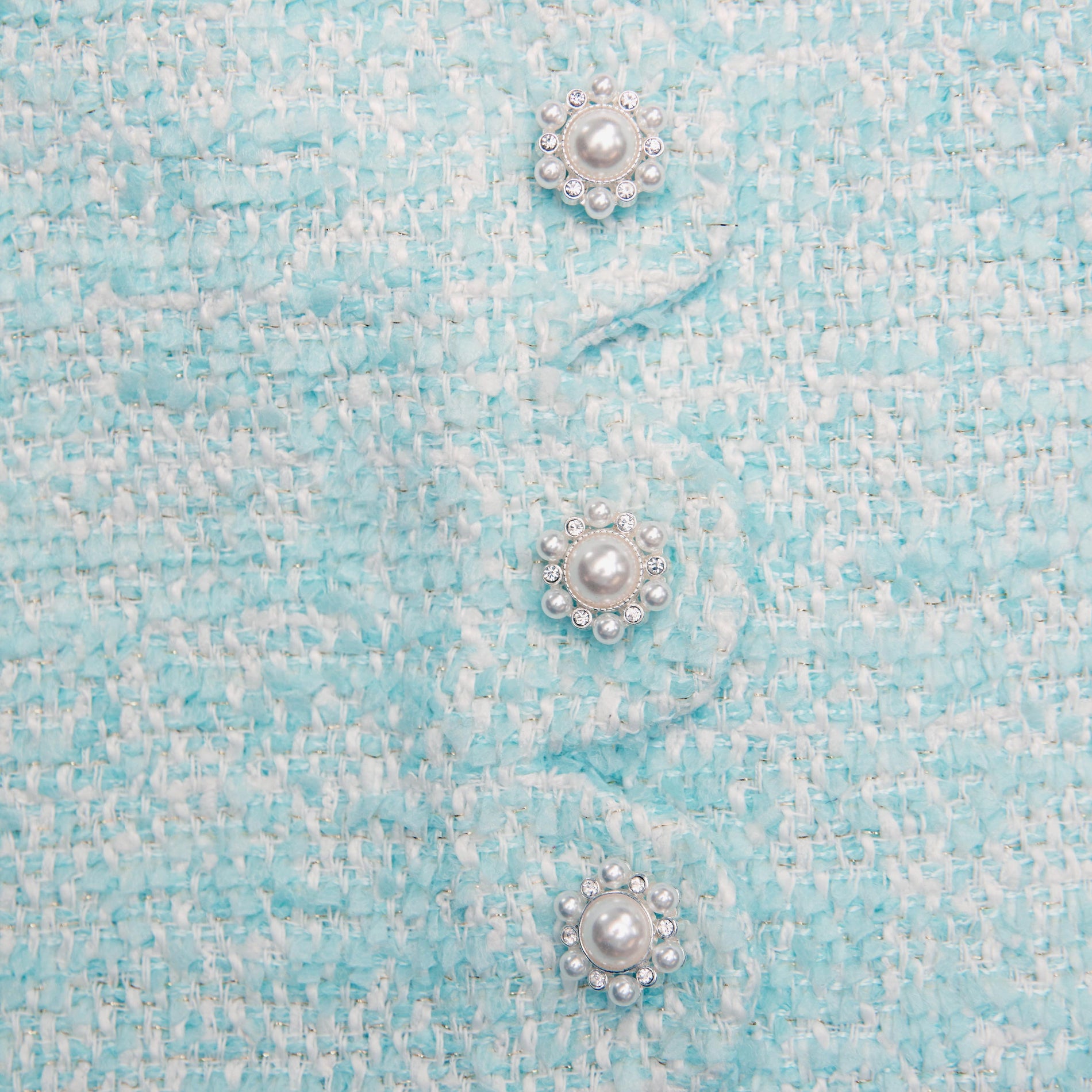 Back view of a woman wearing the Mint Boucle Dress