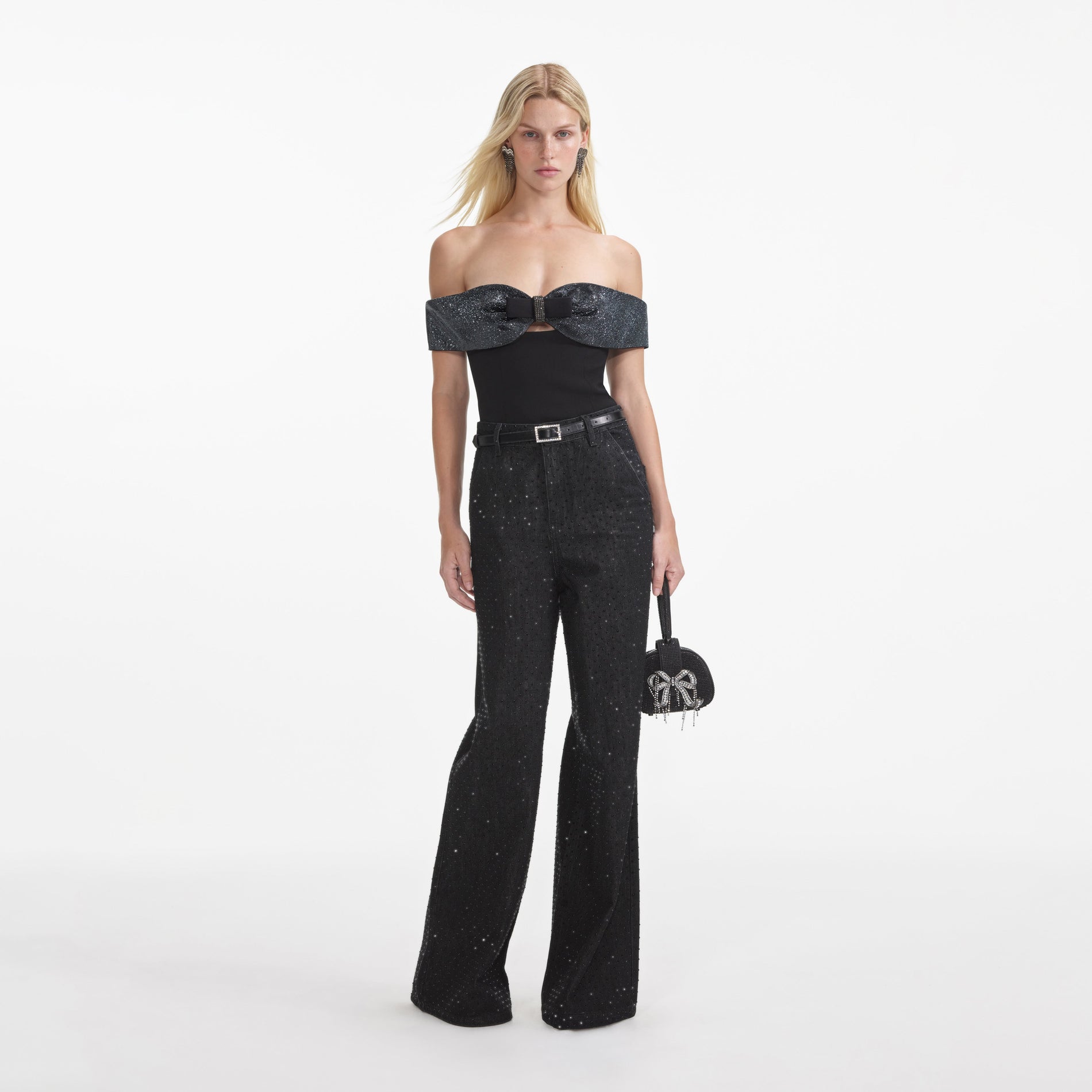 Front view of a woman wearing the Black Crepe Bow Top