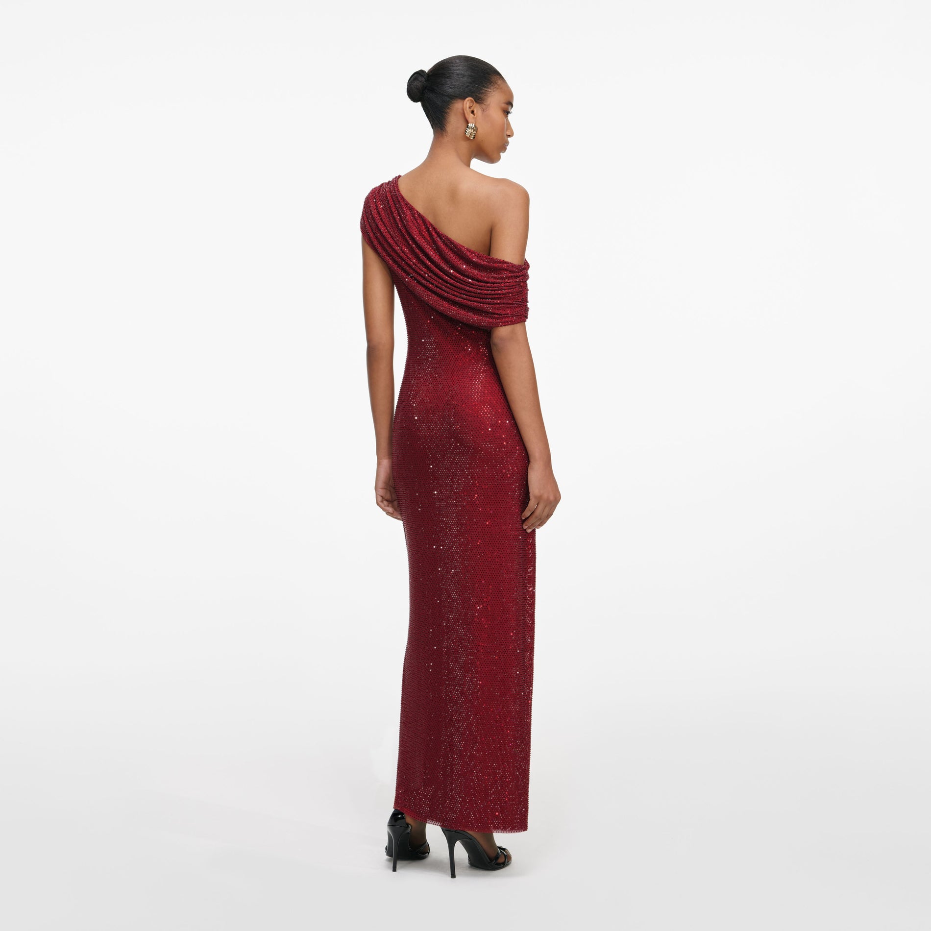 Back view of a woman wearing the Burgundy Rhinestone Drape Midi Dress