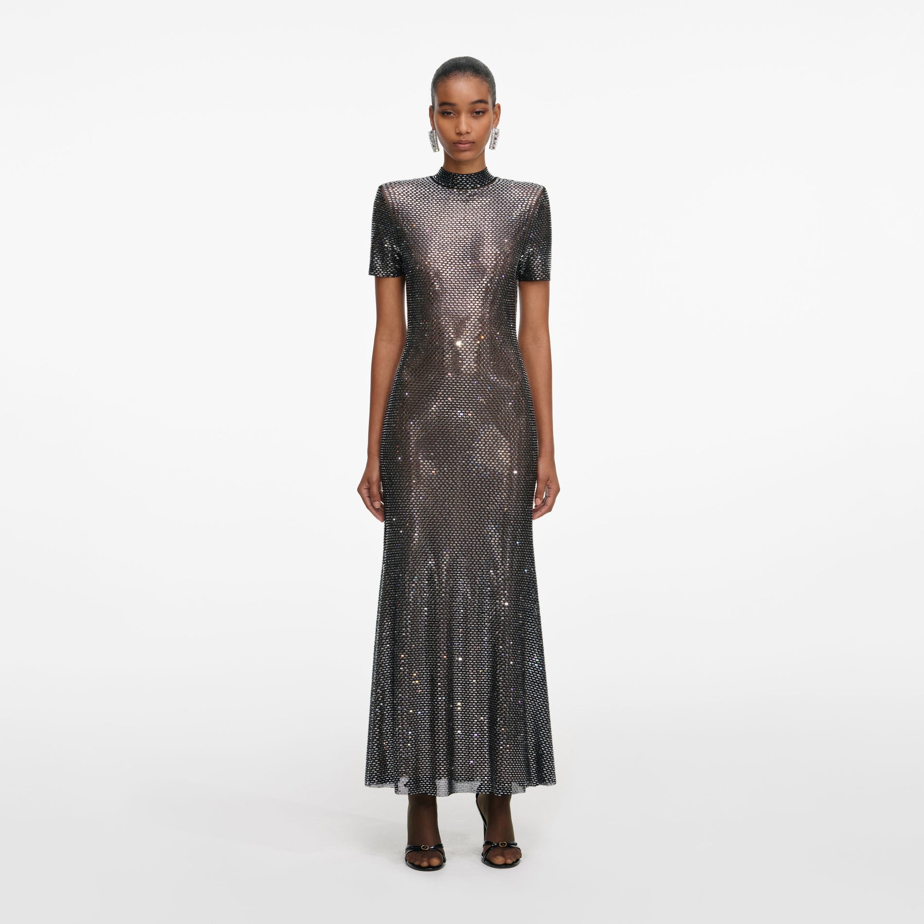 Front view of a woman wearing the Gunmetal Rhinestone Mesh Midi Dress